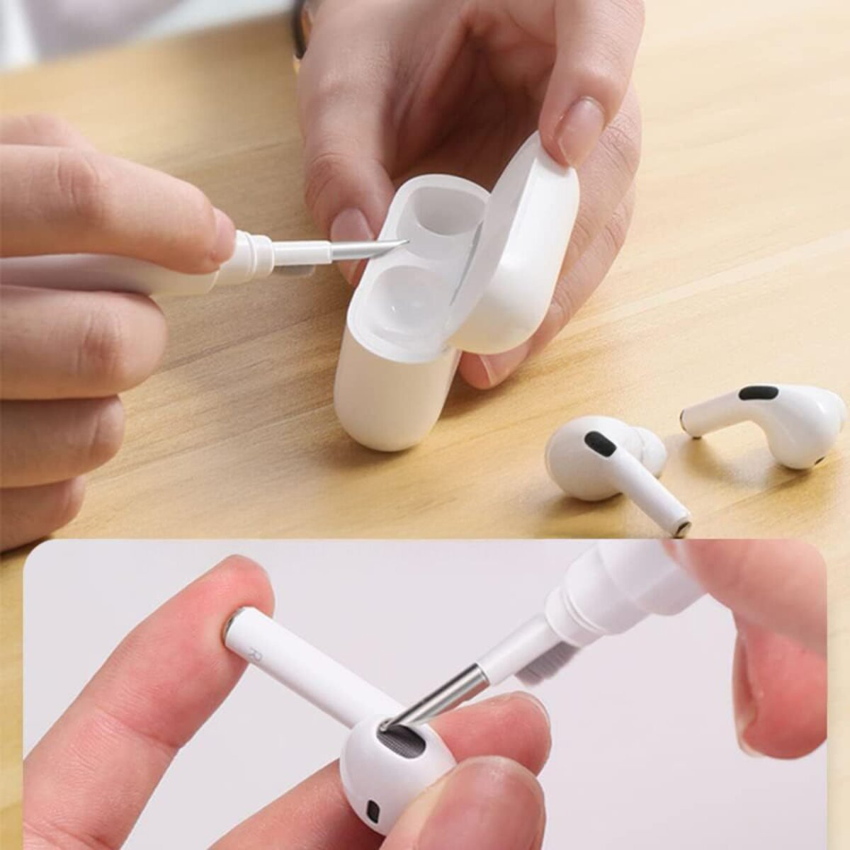 Hands cleaning white AirPods and charging case with a cleaning tool on a wooden surface. Two AirPods are on the right.
