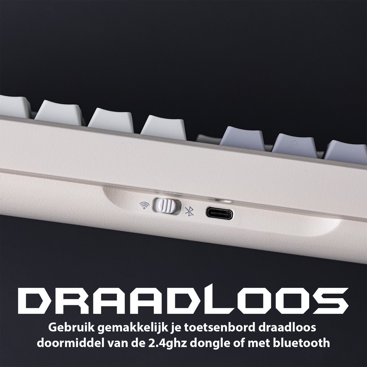 Close-up of a white keyboard with grey keys. Visible are wireless connectivity symbols and a USB-C port. Text below reads 'DRAADLOOS'.