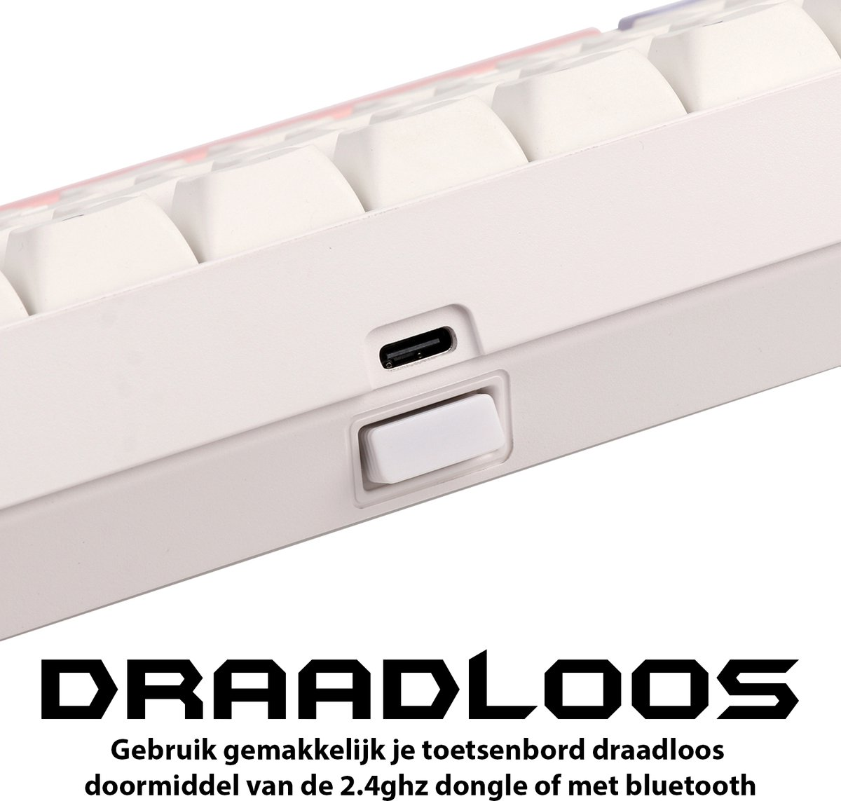 Close-up of a white and gray keyboard. USB port and a white switch are visible. Text below reads 'DRAADLOOS'.