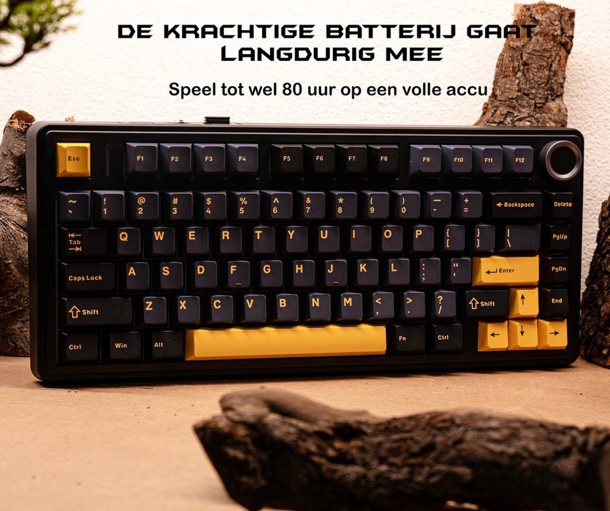 Schwarze und gelbe Tastatur auf Holz. Text oben, beschriftete Tasten, mit Drehknopf.