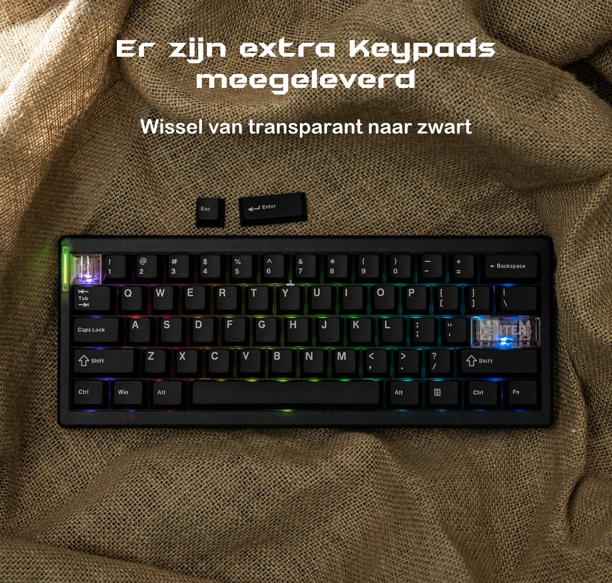 A black keyboard with transparent keycaps. Extra keypads are provided. Background is a brown fabric.