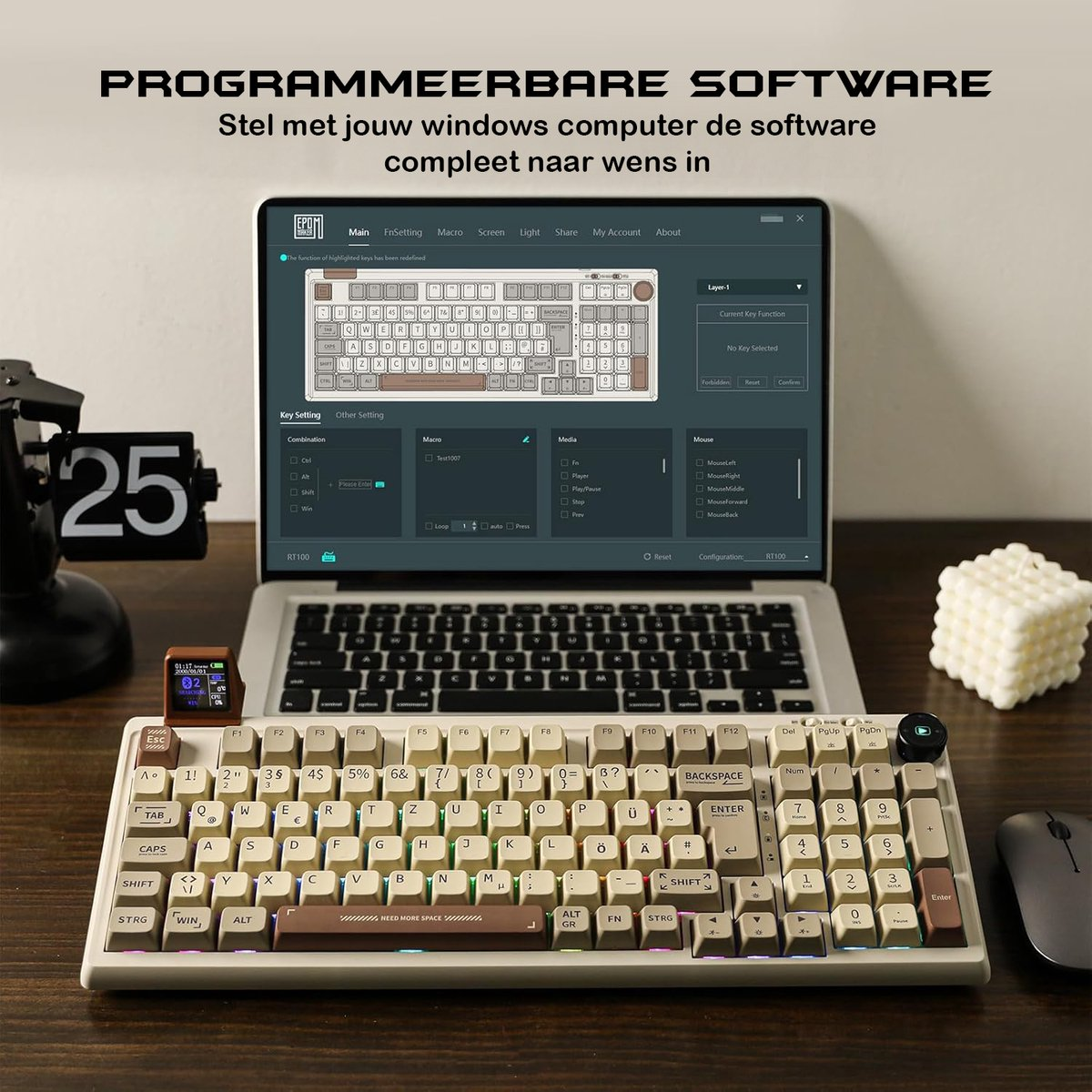A keyboard with a laptop displaying a software interface. A digital clock and a cube are on the side.