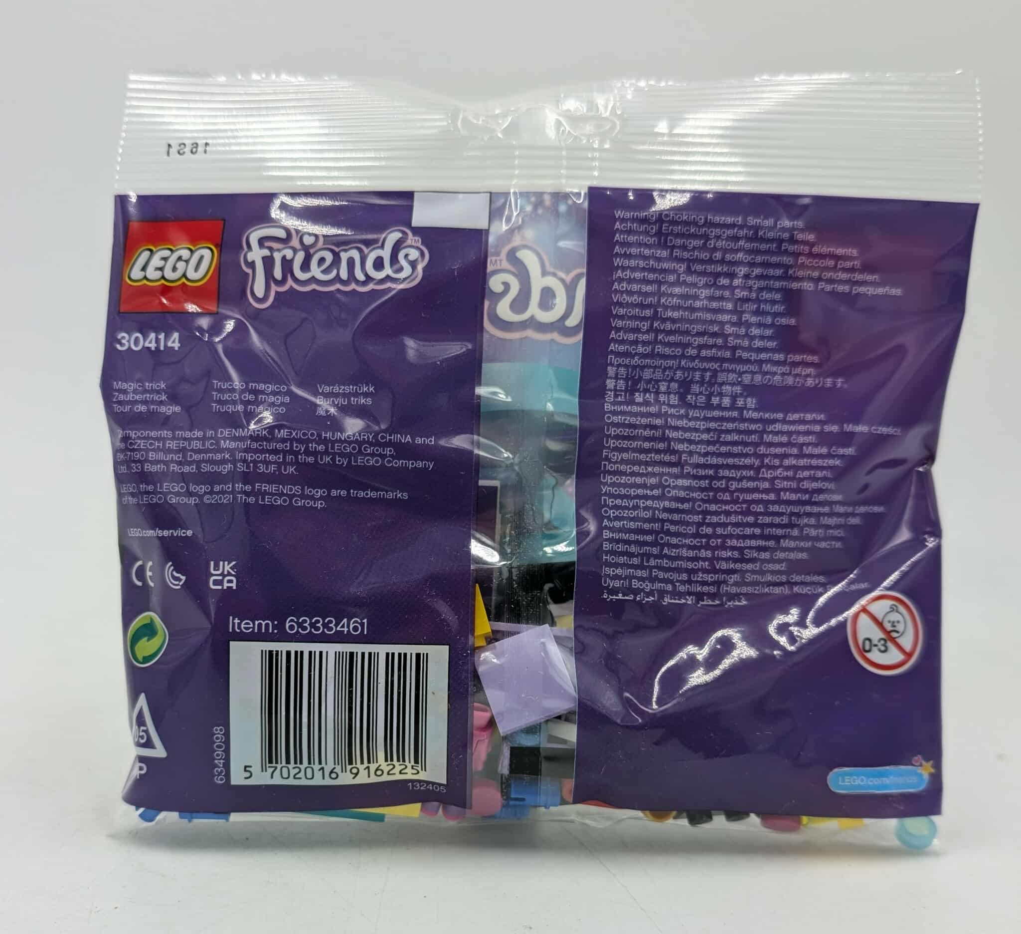 Zapakowany zestaw LEGO Friends. Kod kreskowy i ostrzeżenia na fioletowym tle.