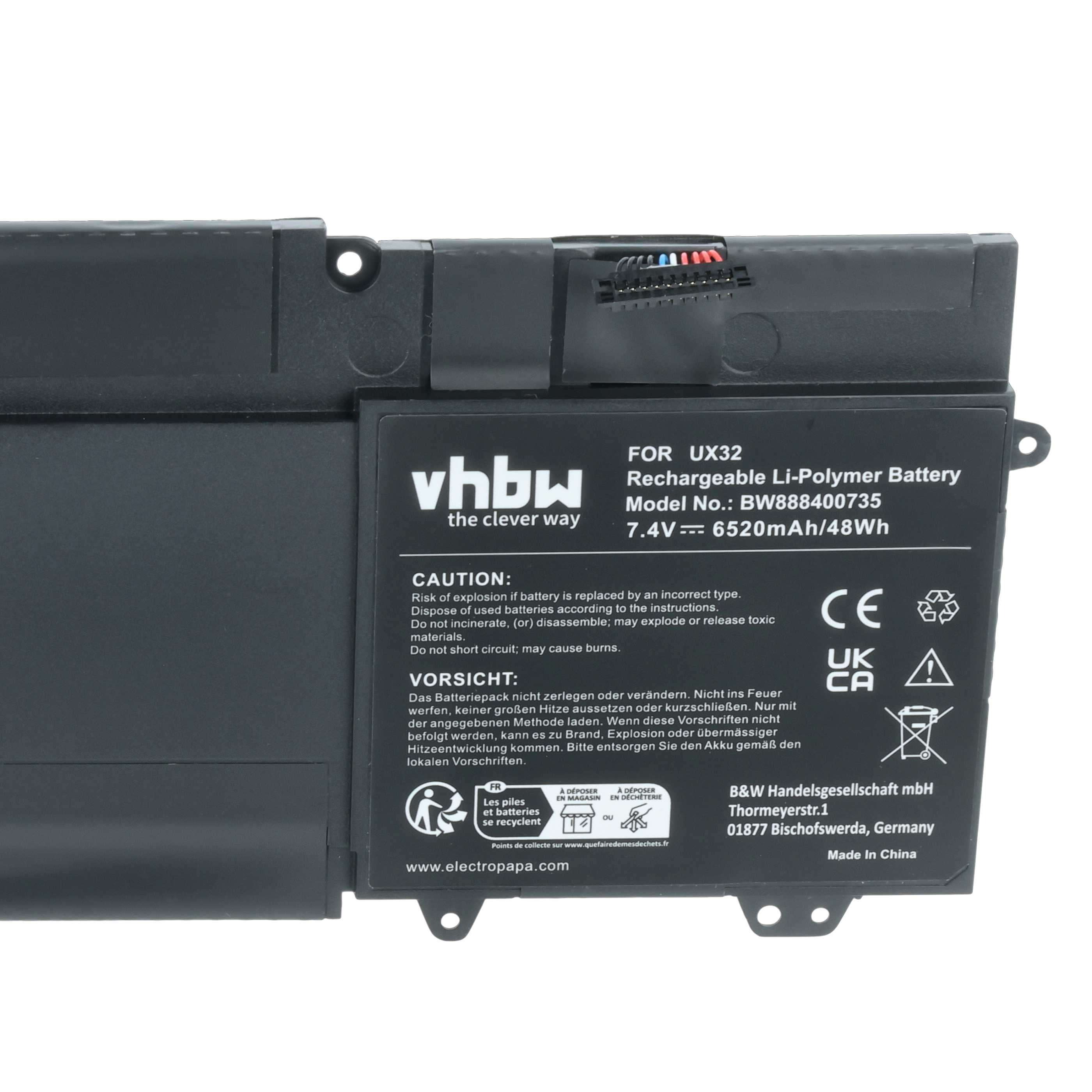 Ein schwarzer Laptop-Akku mit weißem Text. Er hat Warnhinweise und den Markennamen 'vhbw'.