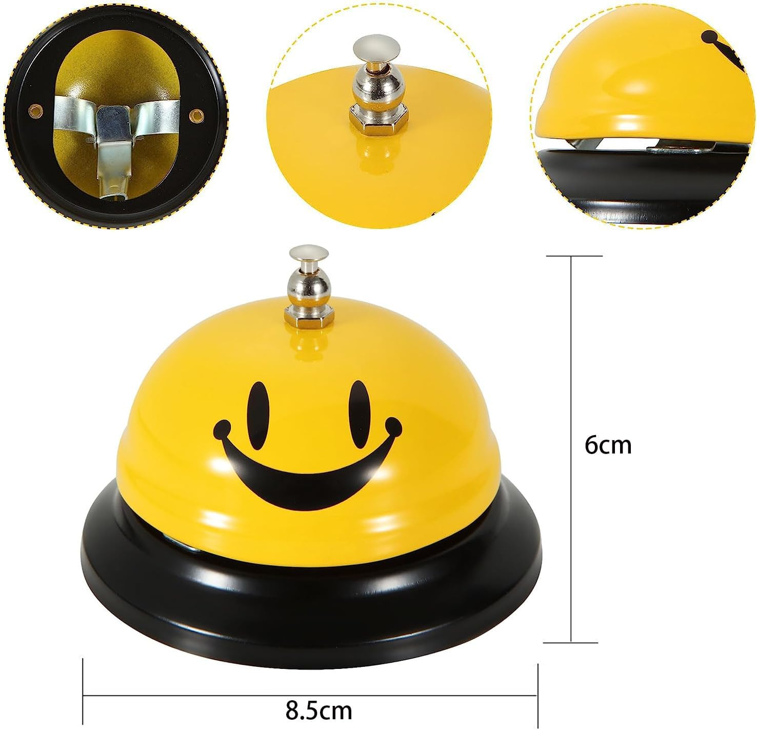 Eine gelbe Glocke mit einem Smiley-Gesicht, schwarzem Sockel und silbernem Klingel. Maße: 8,5 cm breit und 6 cm hoch.