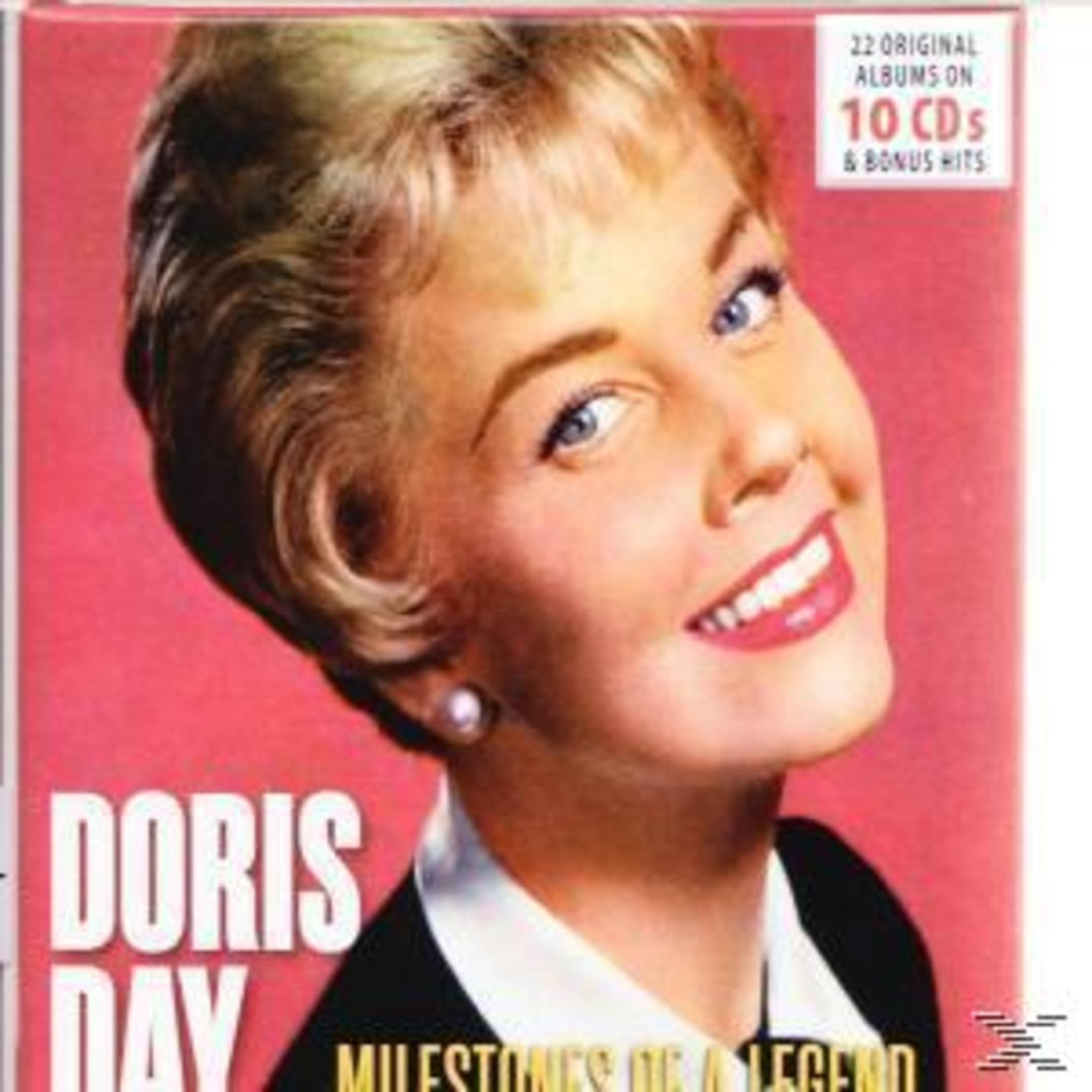 Doris Day albumhoes. Ze glimlacht, draagt een parel. Tekst: '22 Originele albums op 10 cd's & bonus hits'.