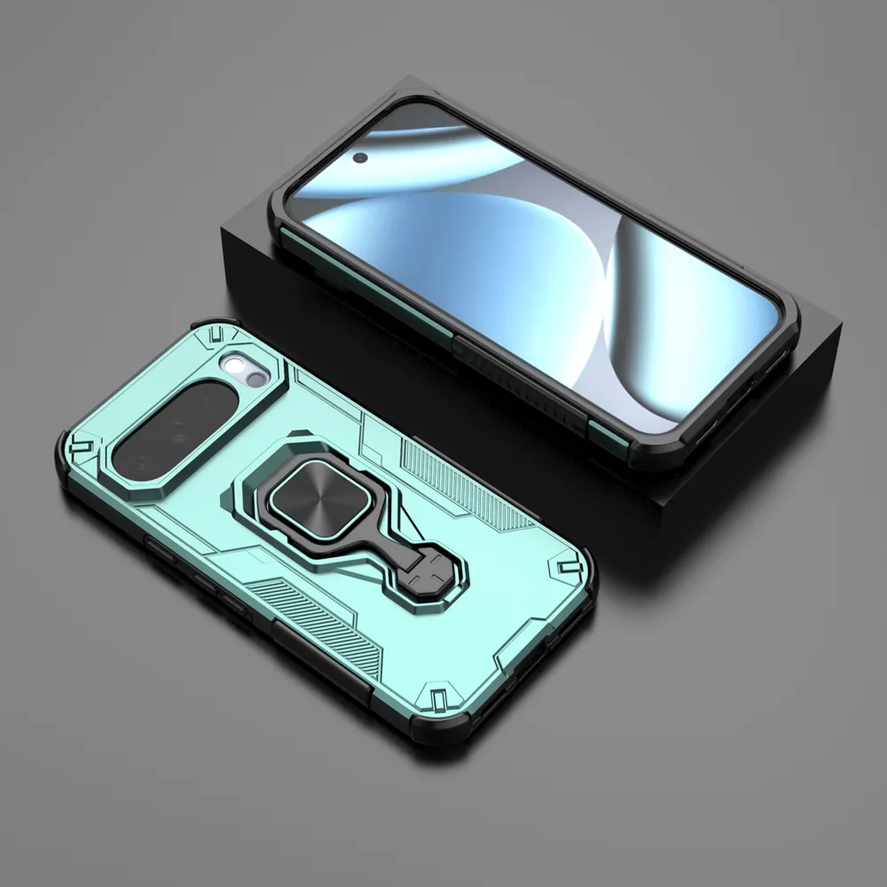 Twee telefoonhoesjes. Eén staat op een zwarte standaard, de andere ligt plat op een grijze ondergrond. Beide zijn teal met zwarte accenten.