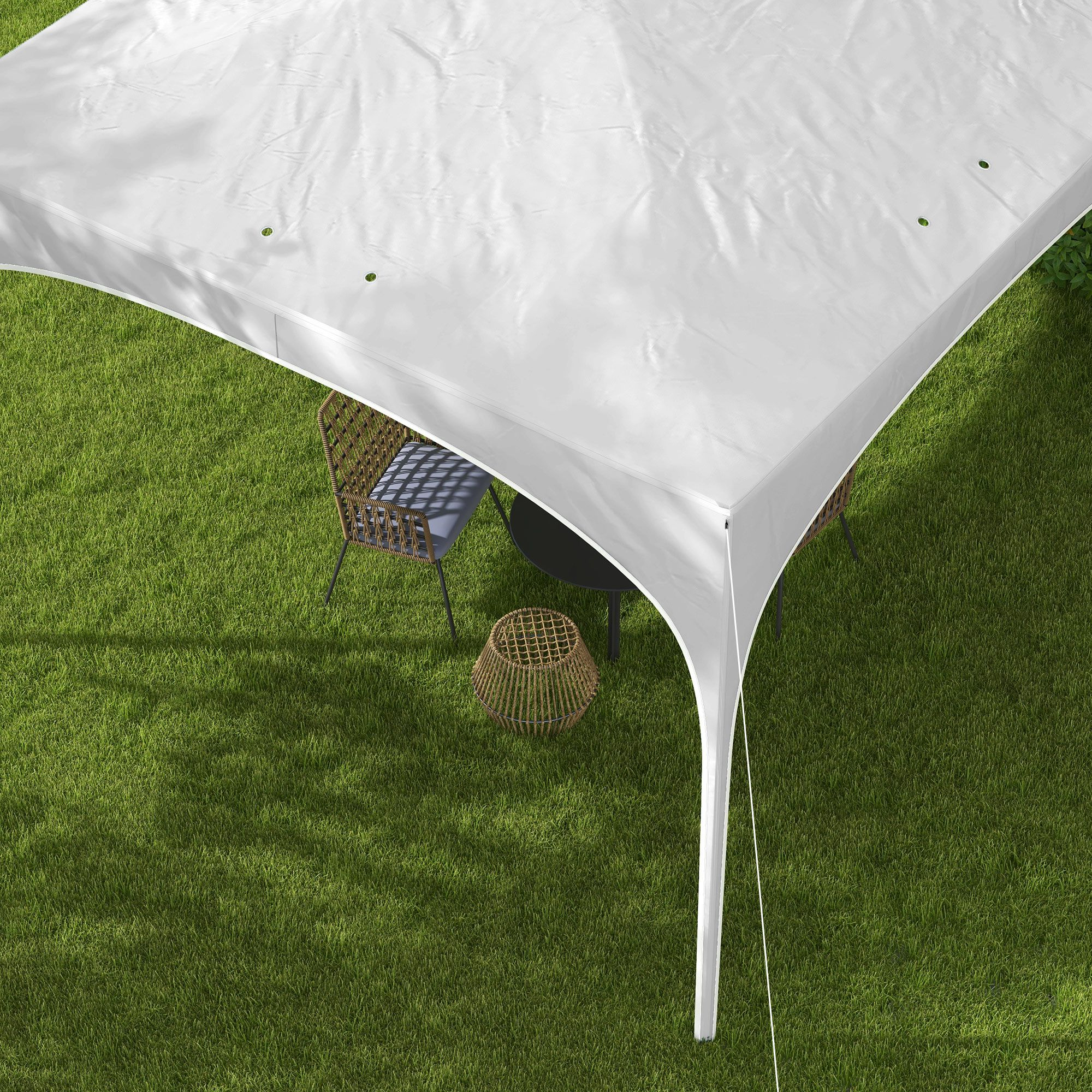 Un toldo blanco sobre hierba verde. Una mesa, una silla y una cesta tejida están debajo del toldo.