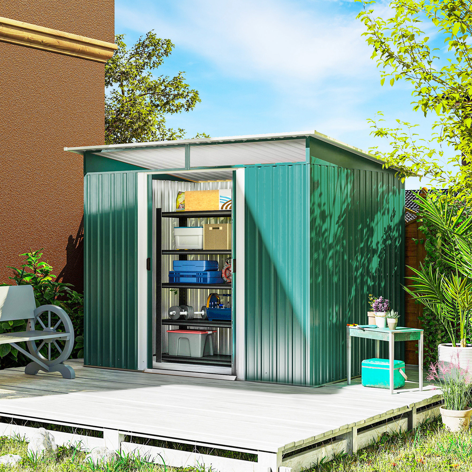 Cobertizo verde con puerta abierta, terraza de madera, banco, plantas y cielo azul.