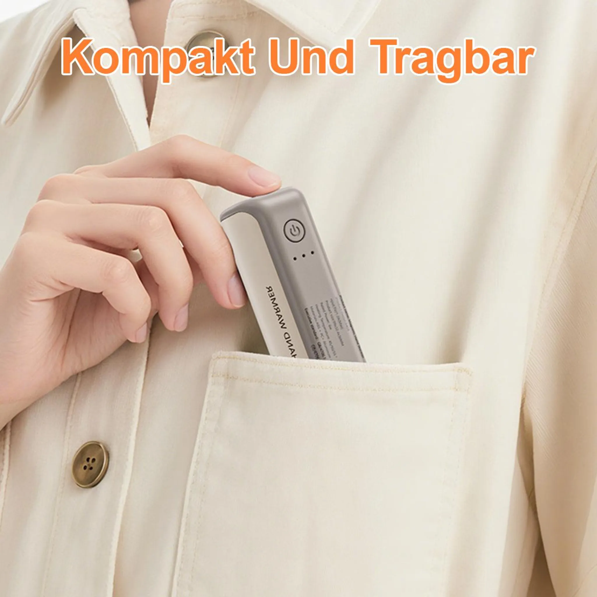 Eine Hand hält einen grauen Handwärmer in einer Tasche. Der Text 'Kompakt Und Tragbar' steht oben.