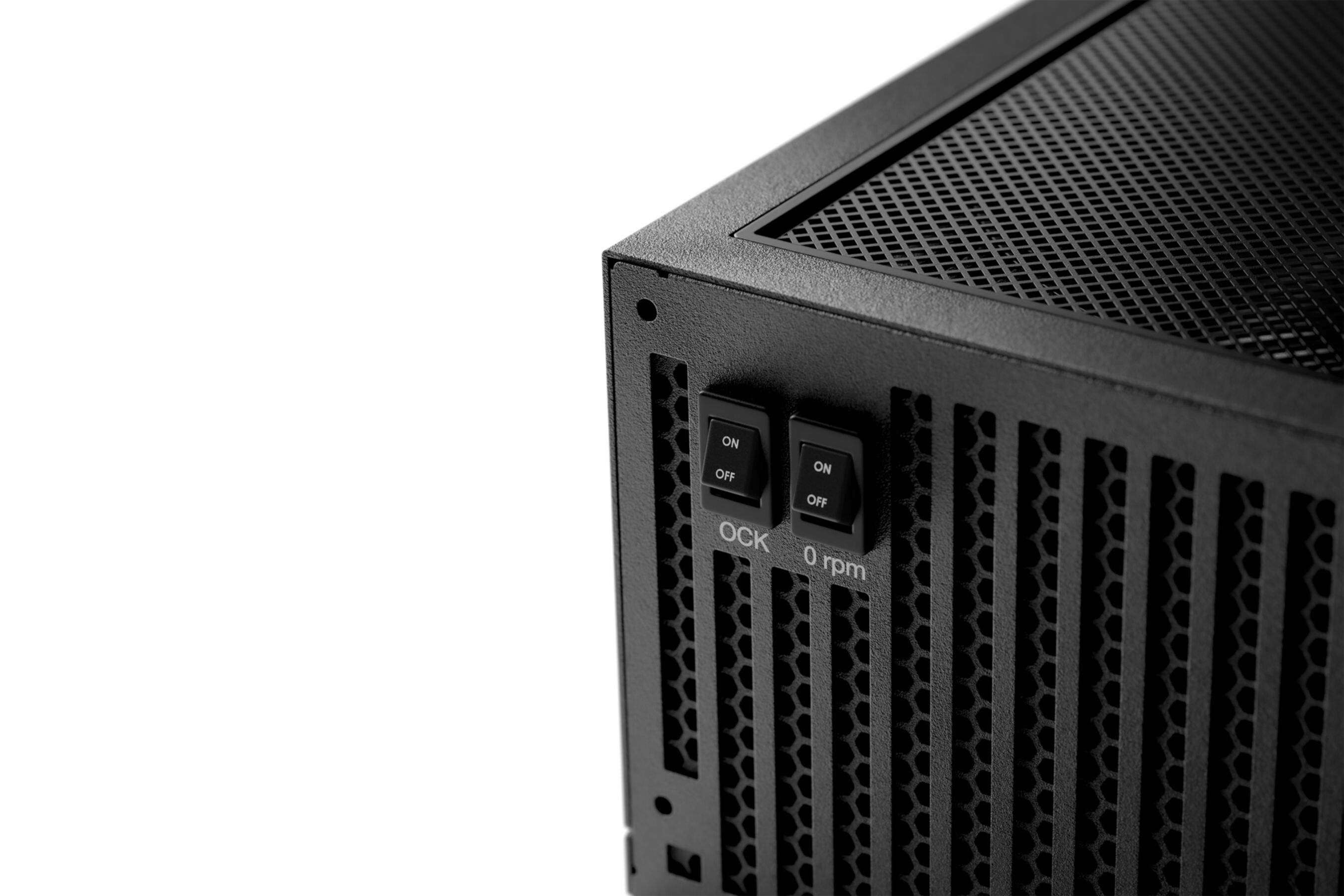 Close-up of a black computer case. Two switches are visible, labeled 'ON' and 'OFF'. 