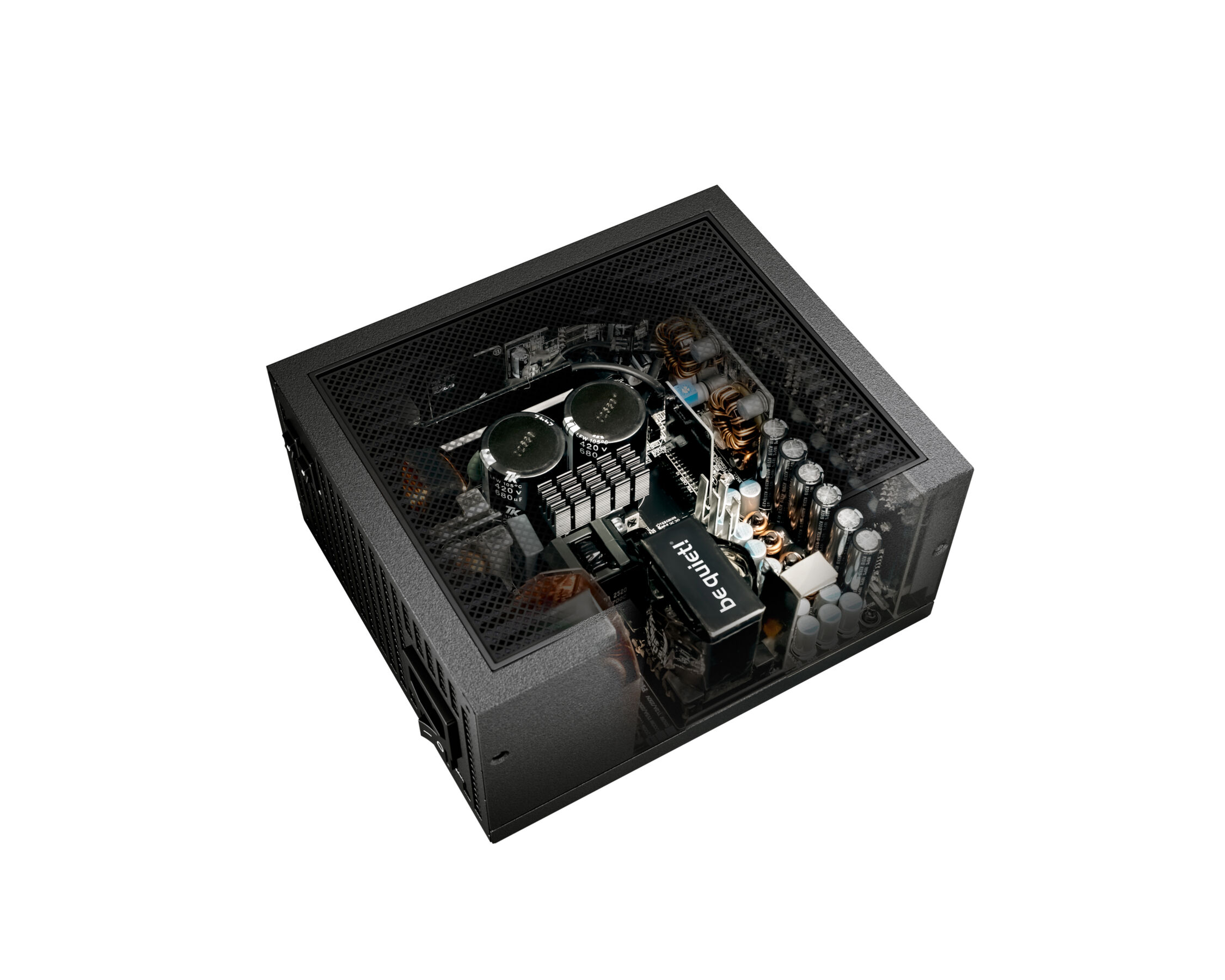 A computer power supply is shown, a black box with internal components visible through a mesh top and side.