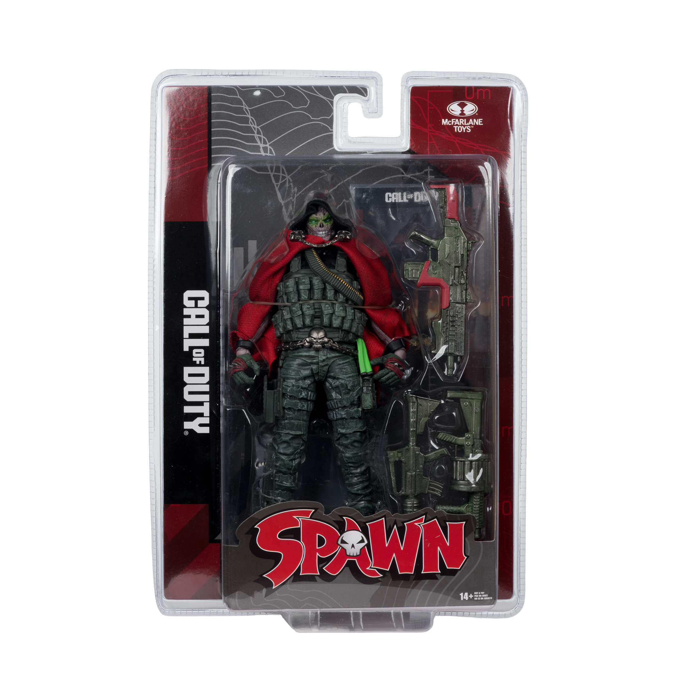 Spawn-Actionfigur in Verpackung, aus Call of Duty. Die Figur hat einen roten Umhang, grüne Haut und Militäruniform. Waffen inklusive.
