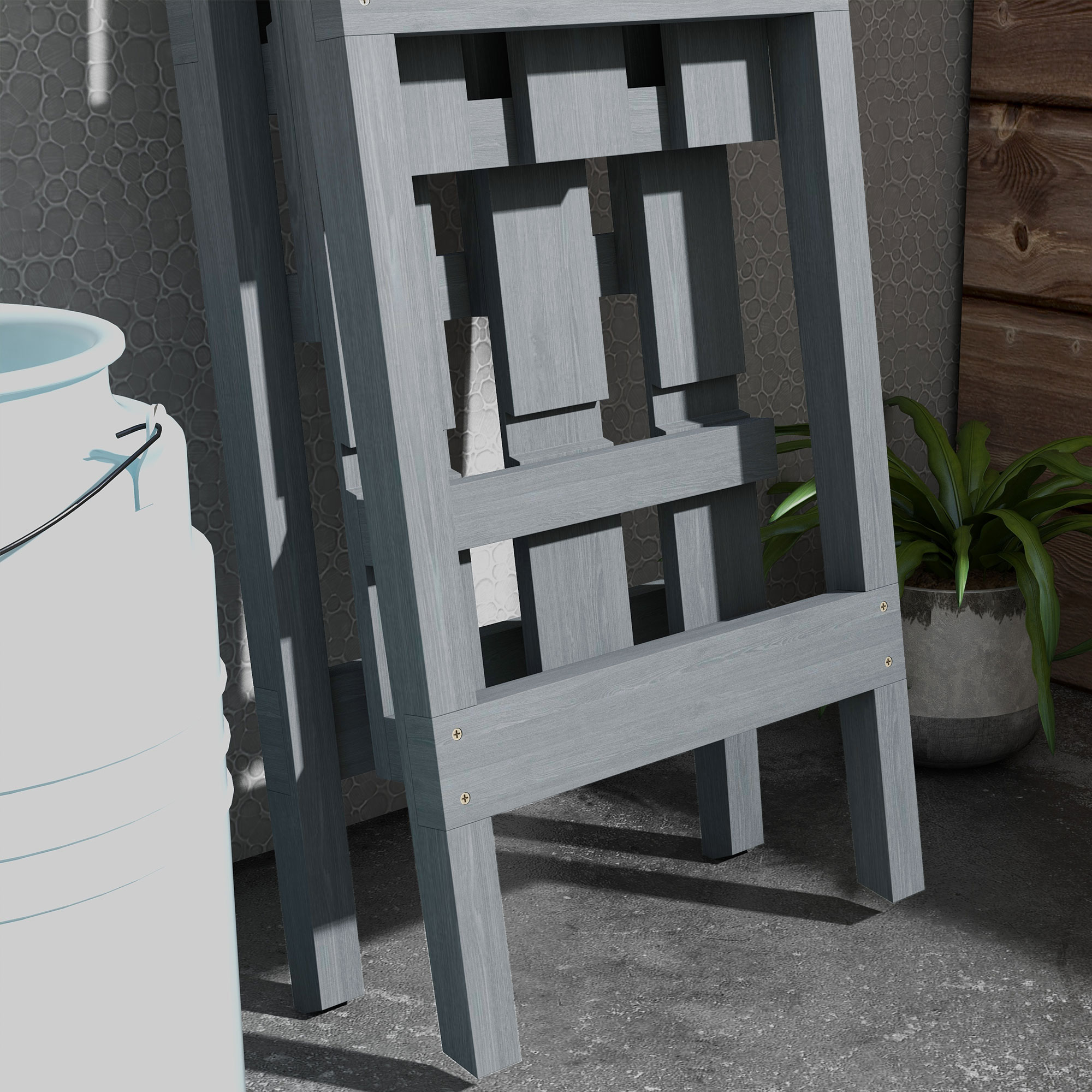 Estructura de madera gris con un recipiente blanco a la izquierda, una planta y pared de madera a la derecha.