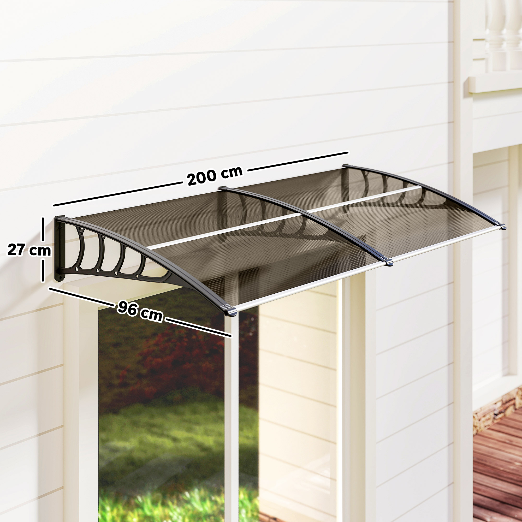Un toldo negro y transparente instalado sobre una ventana. Las dimensiones están etiquetadas. Está montado en una pared blanca.