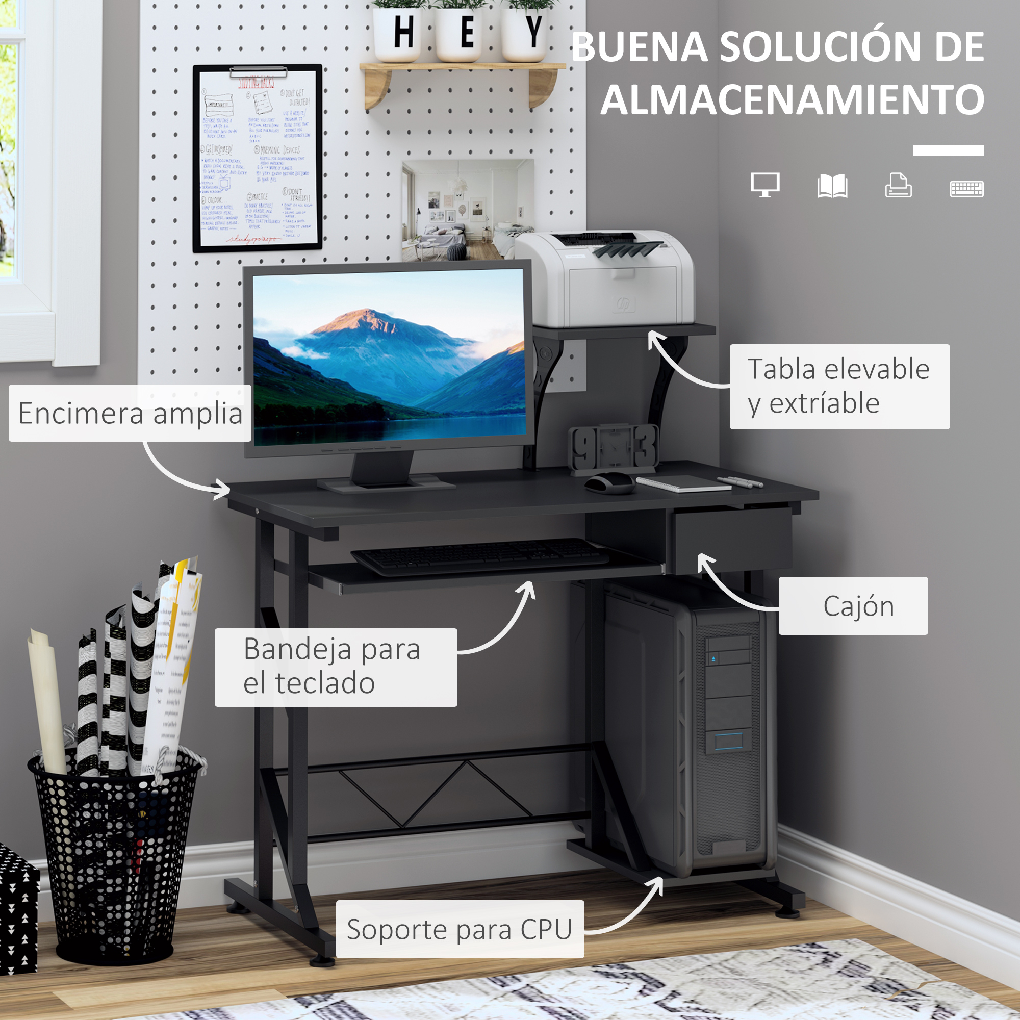 Un escritorio con monitor, impresora, teclado y CPU. Hay un portalápices negro a la izquierda.