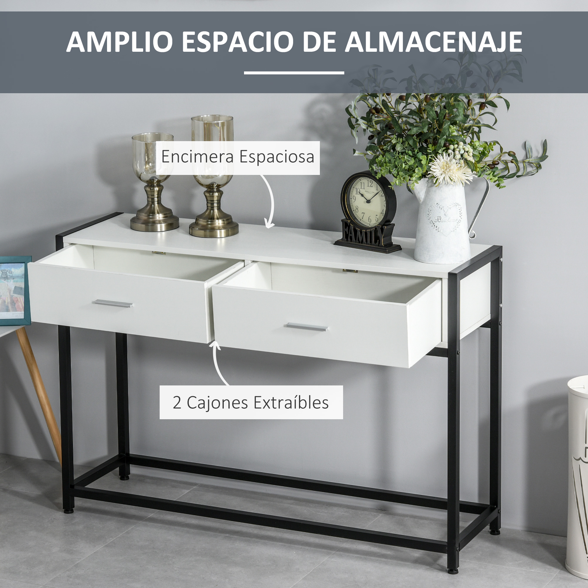 Una consola blanca con dos cajones abiertos, patas negras y objetos decorativos encima, contra una pared gris.