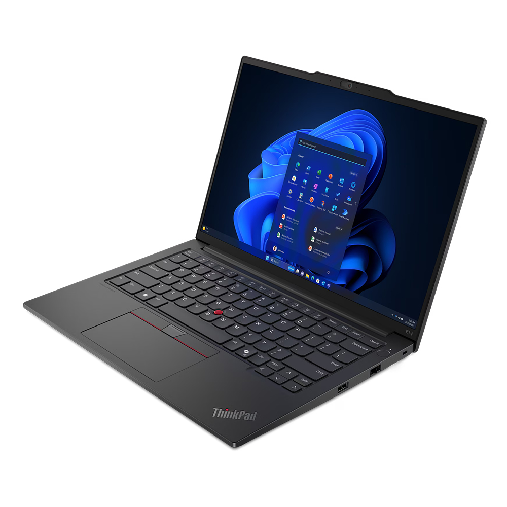 Beyaz yüzey üzerinde siyah dizüstü bilgisayar, Windows ekranı açık. Klavye görünür. ThinkPad logosu mevcut. Ekran mavi duvar kağıdı ve simgeler gösteriyor.