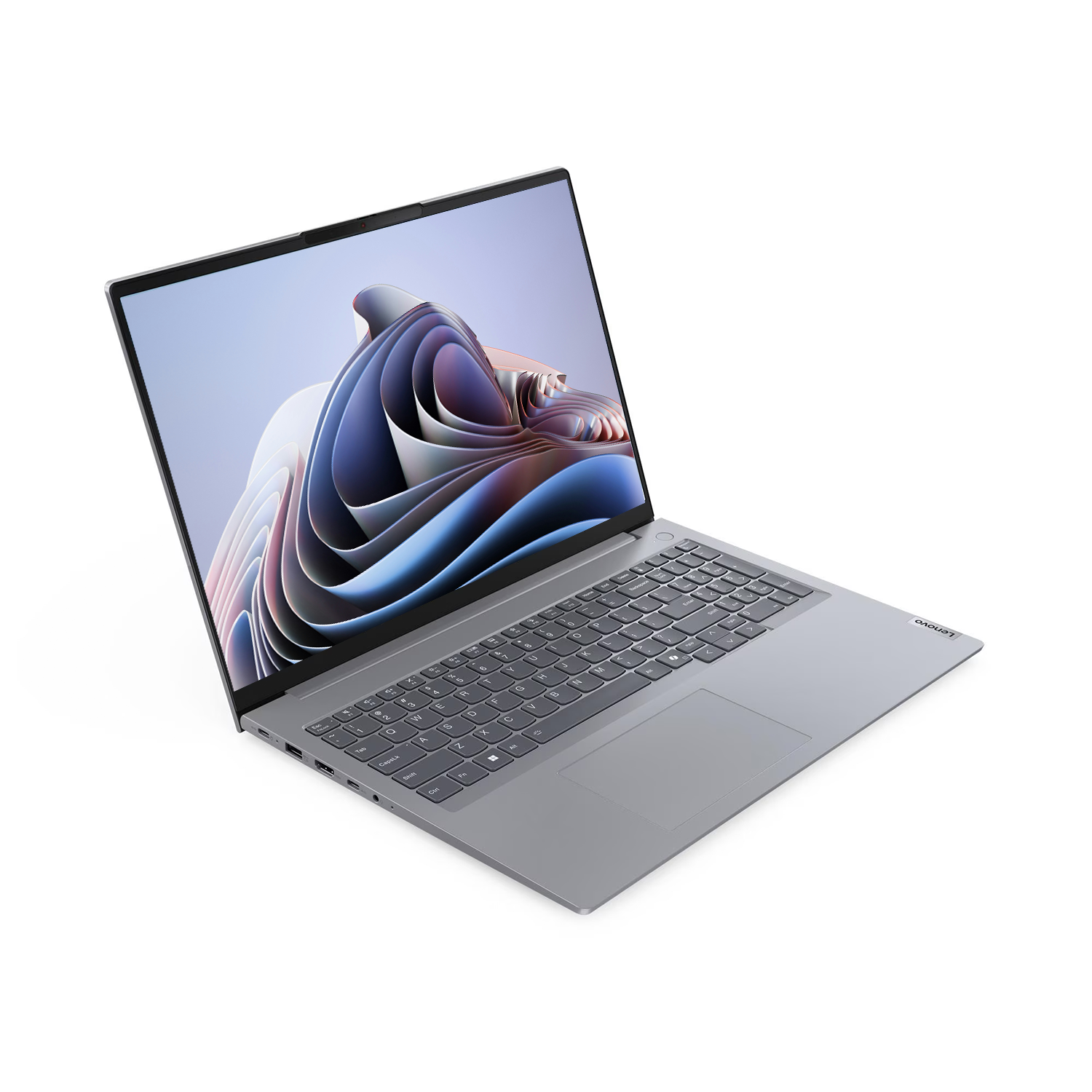 Gri bir Lenovo dizüstü bilgisayar açık, ekranda renkli soyut bir görüntü gösteriyor, beyaz bir arka plan üzerinde.
