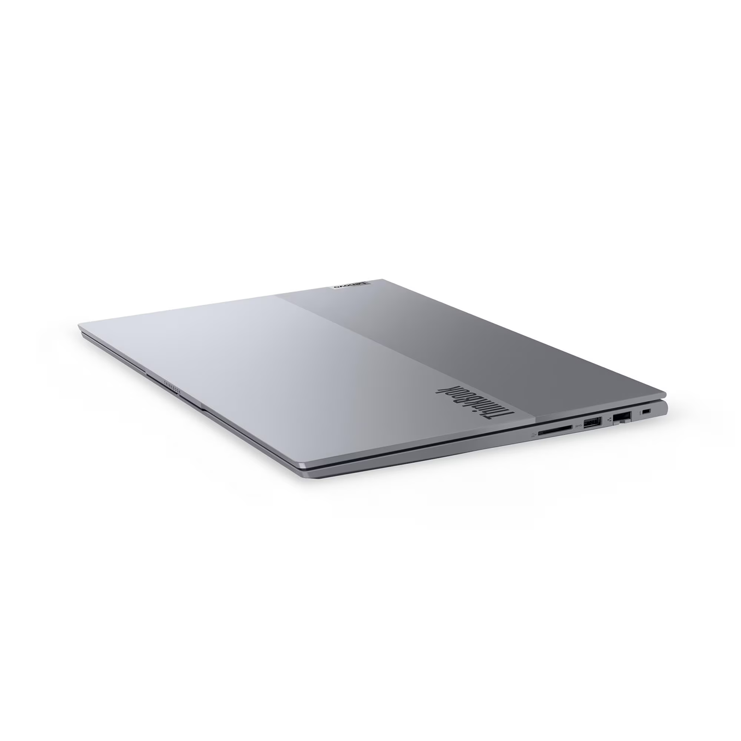 Gri bir ThinkBook dizüstü bilgisayar hafifçe açıktır, yukarıdan açılı olarak. Lenovo ve ThinkBook logoları görünür. Beyaz zemin.