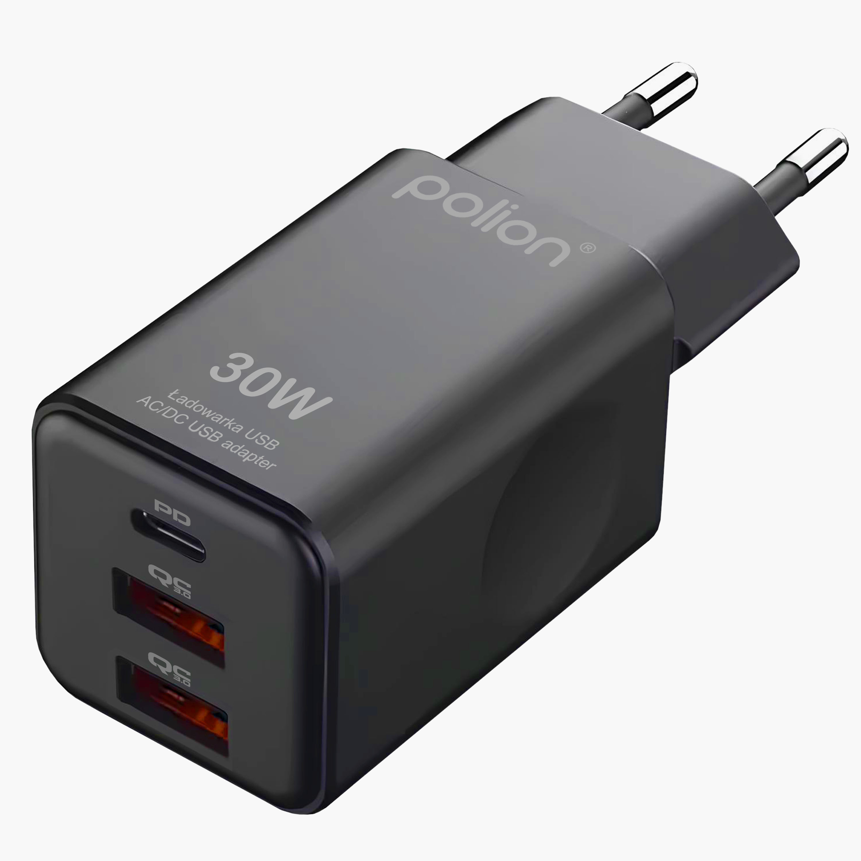 Czarna ładowarka USB 30W. Posiada dwa porty USB i dwa metalowe bolce do wtyczki.