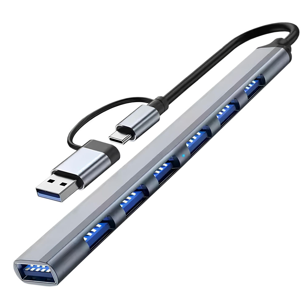 Srebrny hub USB z wieloma portami, złączem USB-A i USB-C oraz czarnym kablem, wyizolowany na białym tle.