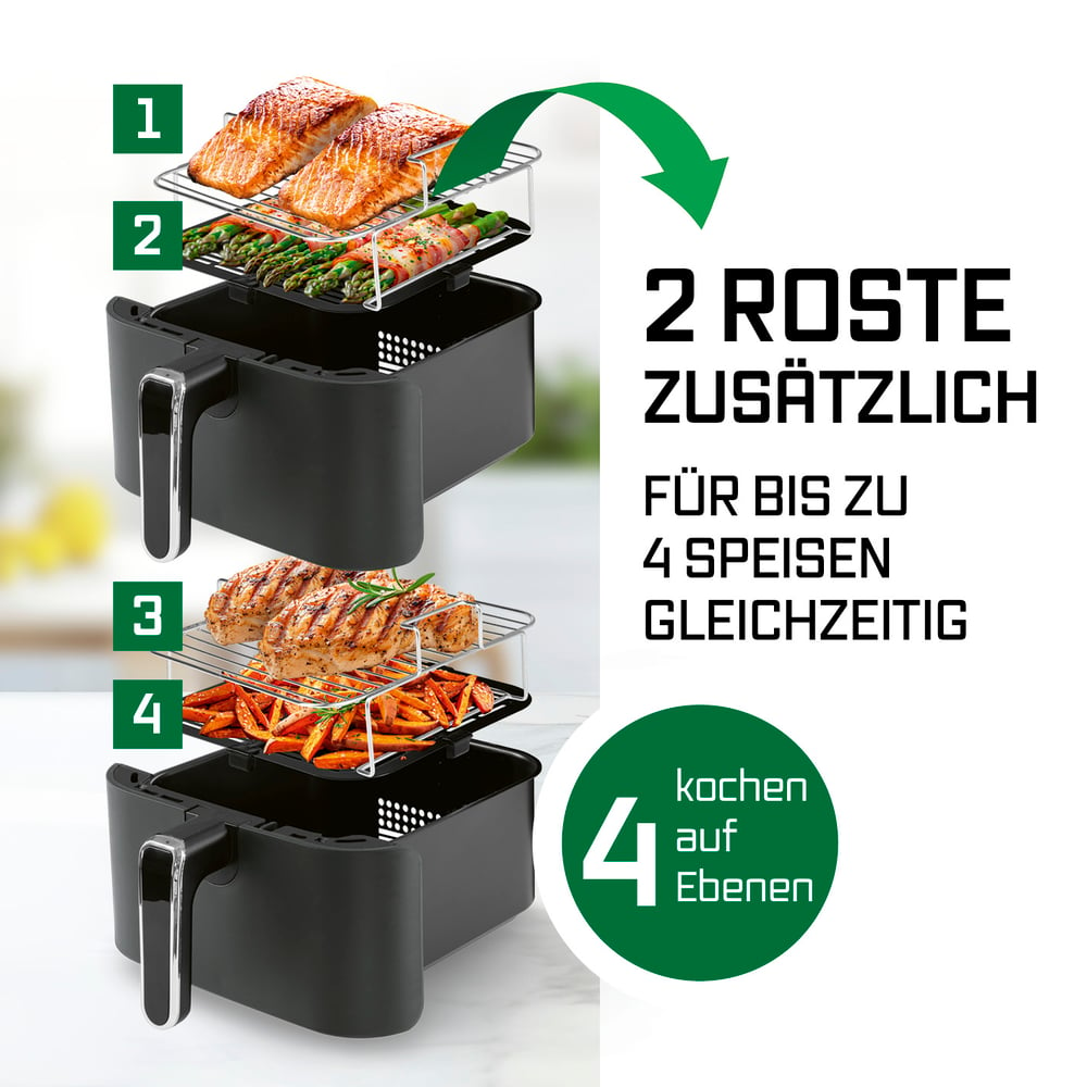 Eine Heißluftfritteuse mit zwei Rosten. Lachs, Spargel, Hähnchen und Karotten werden gezeigt. Text sagt: '2 Roste für bis zu 4 Speisen gleichzeitig'.