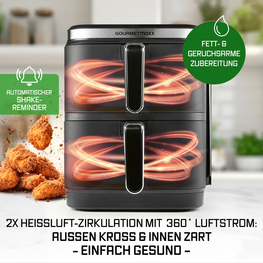 Friggitrice ad aria nera con manici. Visualizza il testo: 'promemoria di agitazione automatica', 'cottura senza grassi' e cibi fritti. Gourmetmaxx.