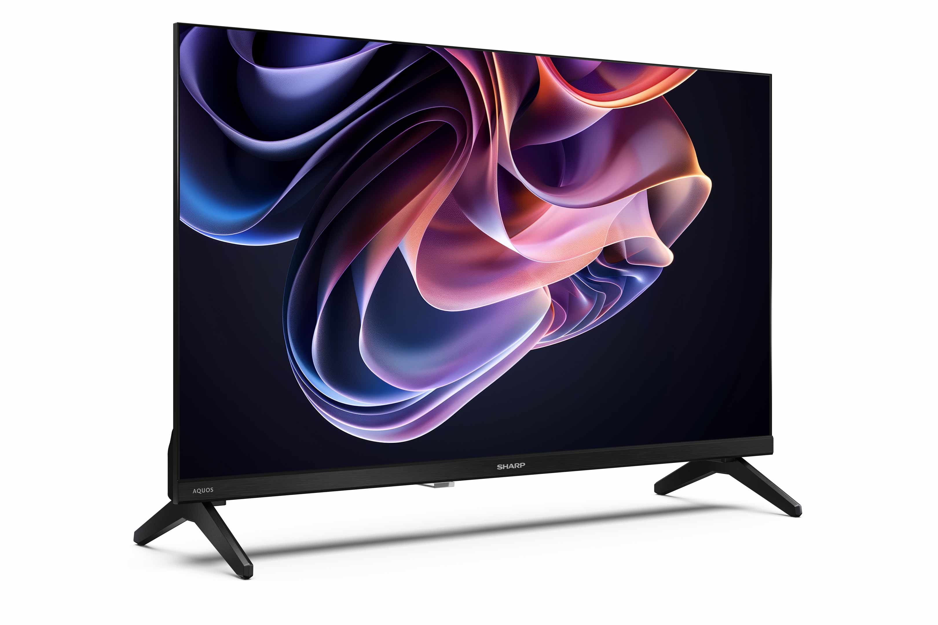 Ein Sharp Aquos Fernseher zeigt ein farbenfrohes, abstraktes Muster. Er hat schwarze Beine, einen schwarzen Rahmen und einen weißen Hintergrund.