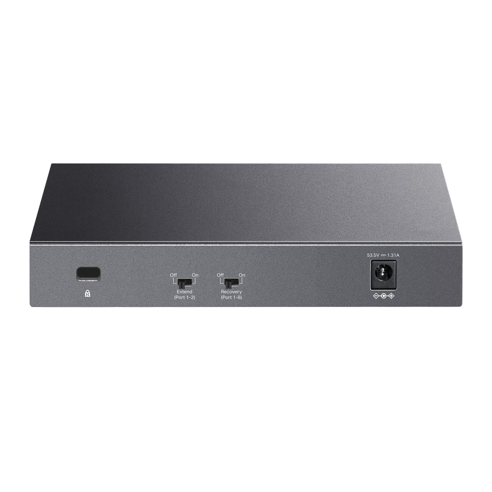 Un switch de red gris con puertos y entrada de alimentación. Tiene botones para extender y recuperar funciones. Un puerto de adaptador de corriente.