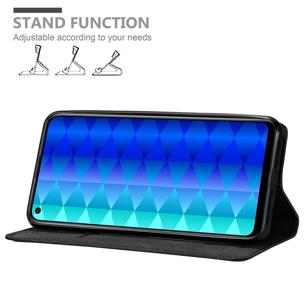 Ein Telefon in einer schwarzen Hülle liegt auf weißem Untergrund. Der Bildschirm zeigt ein blau-grünes geometrisches Muster.