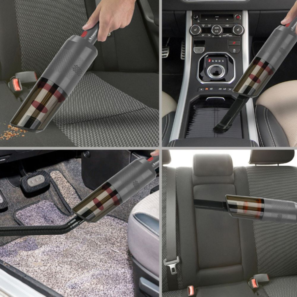 Un aspirapolvere portatile viene utilizzato in un'auto. Pulisce sedili, pavimento e console. L'aspirapolvere è grigio e nero.