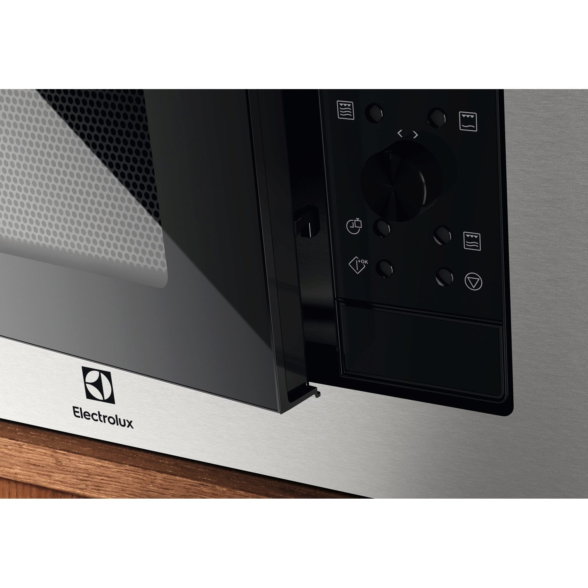 Zbliżenie kuchenki mikrofalowej. Widoczna marka Electrolux. Posiada panel sterowania i ciemne szklane drzwi.