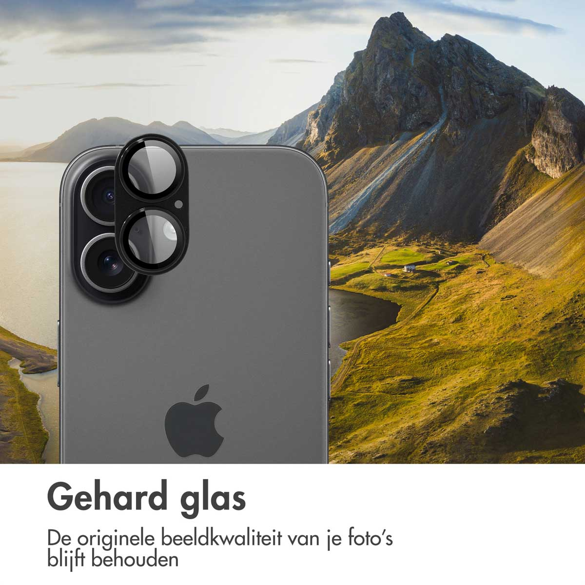 A phone with lens covers in front of a landscape with mountains, a lake, and green vegetation. The Apple logo is visible.