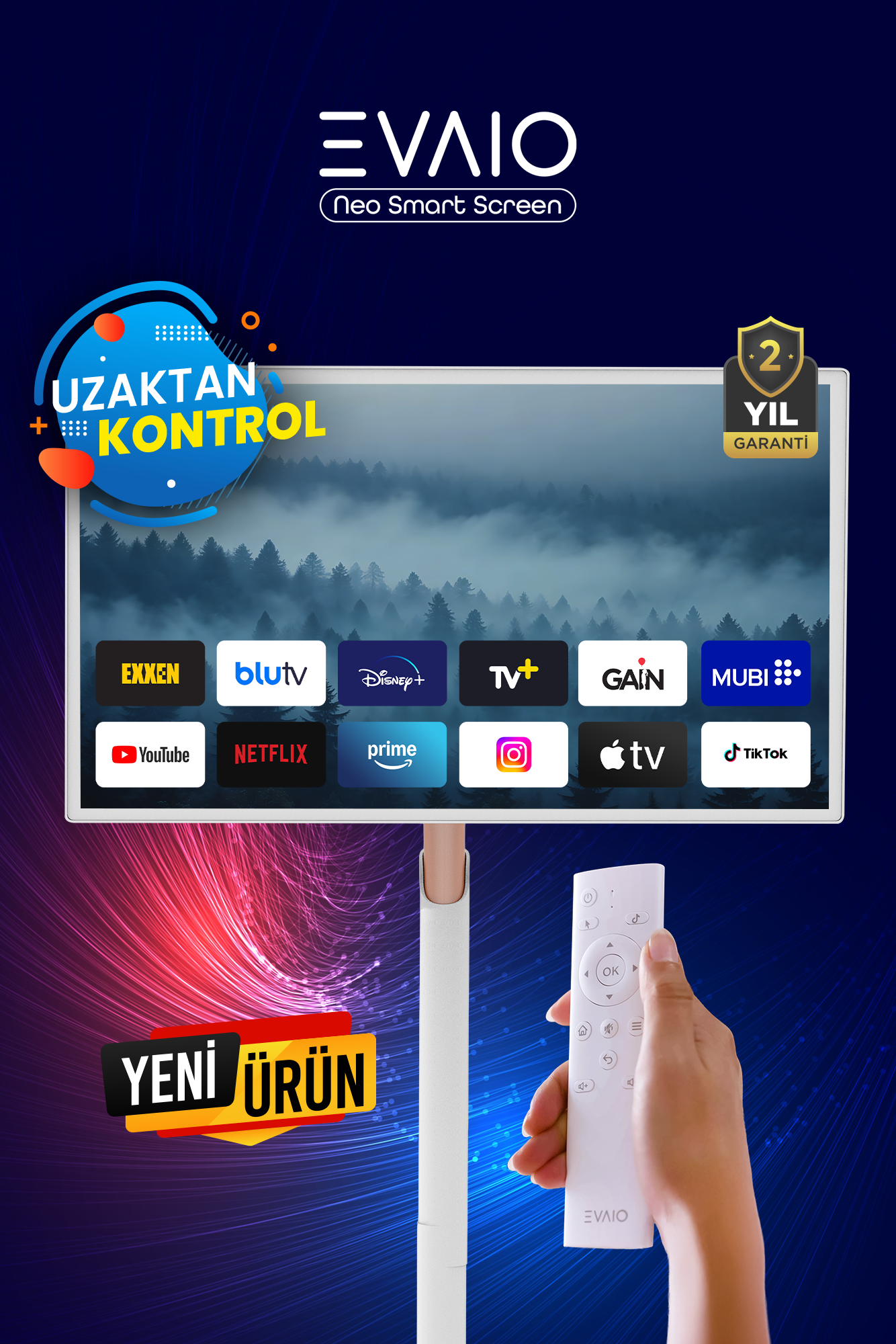 Beyaz bir TV ekranı, uygulama simgelerini ve bir orman görüntüsünü gösteriyor. Bir el uzaktan kumandayı tutuyor. Metin 'Yeni Ürün' ve 'Uzaktan Kumanda' diyor.