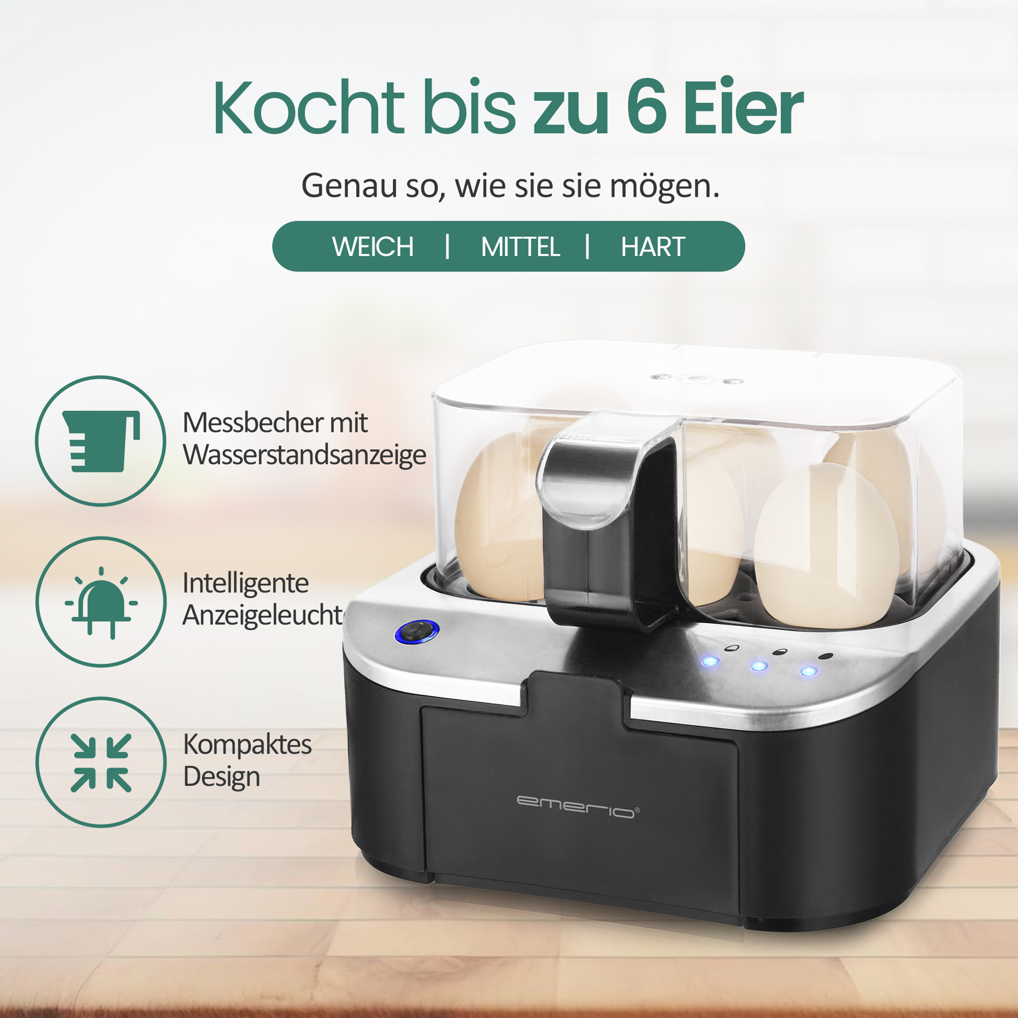 Ein Eierkocher mit Eiern darin. Es hat einen schwarzen Sockel und eine silberne Oberseite. Text lautet 'Kocht bis zu 6 Eier'.