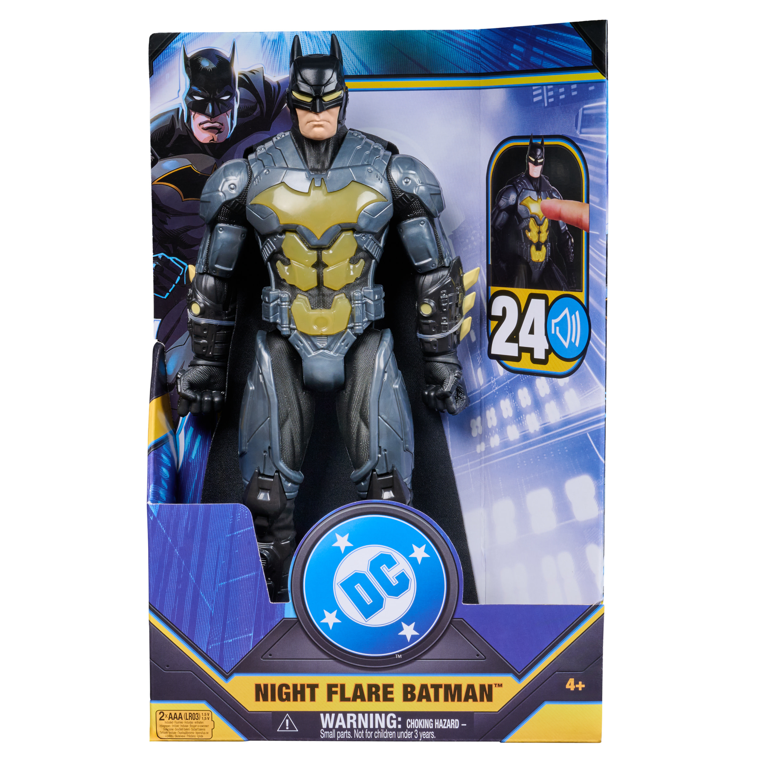 Eine Batman-Actionfigur in einer Box. Sie ist grau und schwarz, mit einem gelben Brustemblem. Die Box hat das DC-Logo.