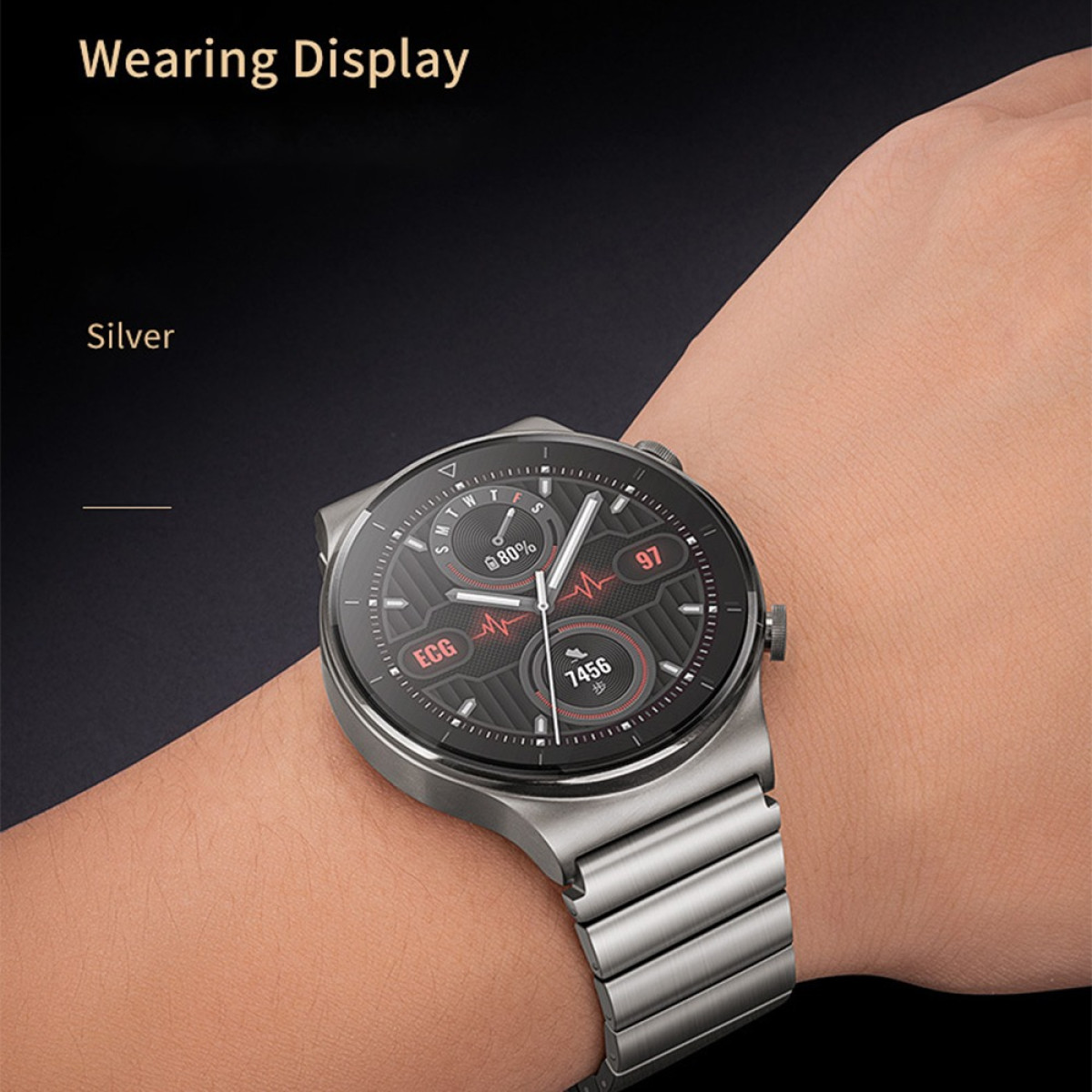 Eine silberne Smartwatch am Handgelenk zeigt Gesundheitsdaten an. Die Uhr hat ein schwarzes Zifferblatt mit roten Akzenten. Der Hintergrund ist dunkel.
