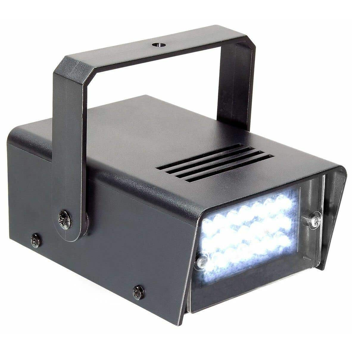 Una luz LED negra con asa. La parte delantera tiene un panel de luces blancas brillantes. Hay tornillos en el lateral.