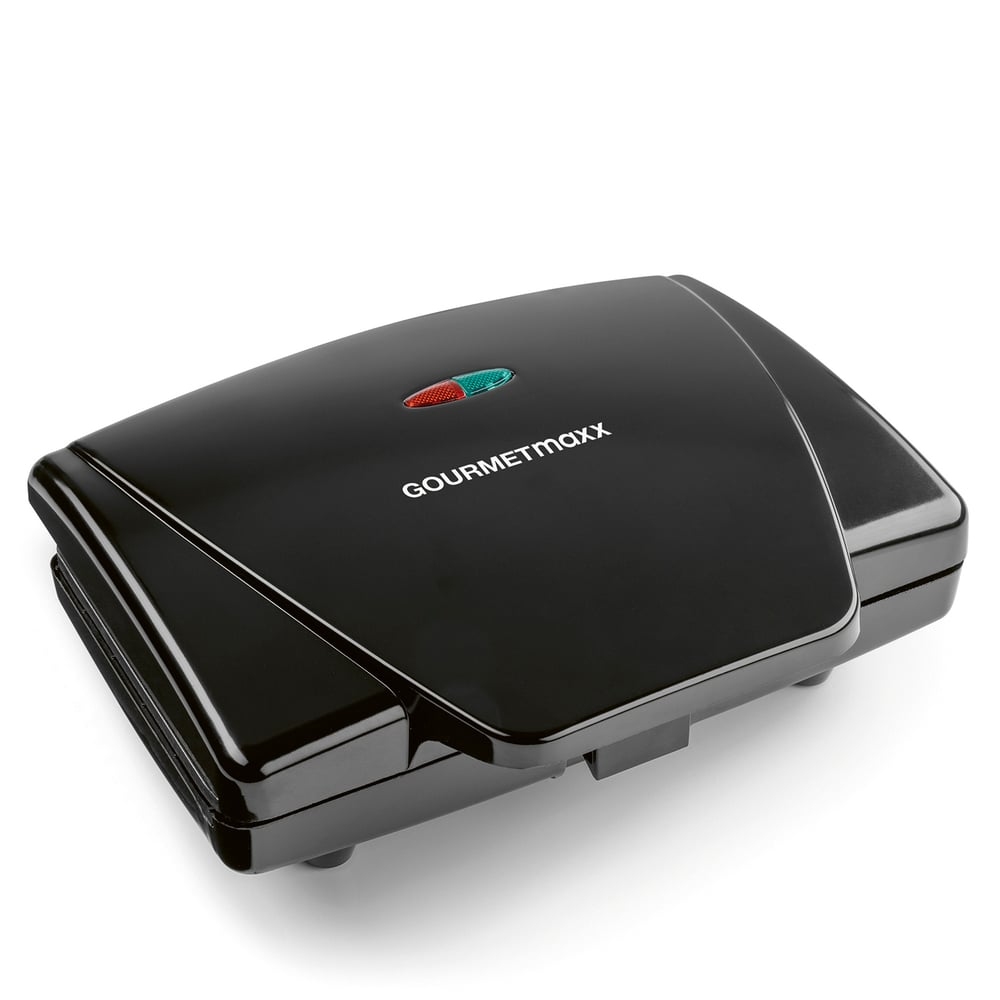 Ein schwarzer Gourmetmaxx-Sandwichmaker, Draufsicht. Hat rote und grüne Lichter und den Markennamen oben. Weißer Hintergrund.