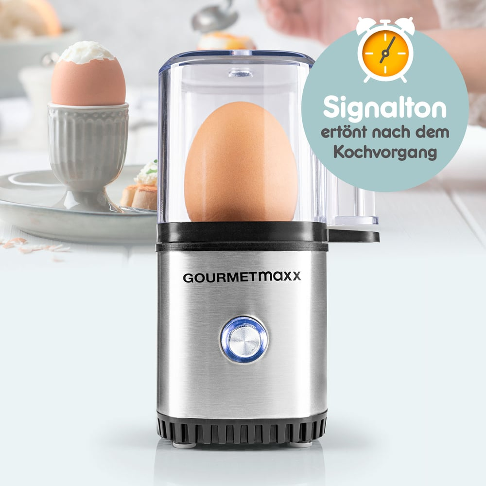 Jajko w jajowarze. Kolejne jajko w uchwycie. Tekst mówi 'Signalton ertönt nach dem Kochvorgang' obok ikony zegara.