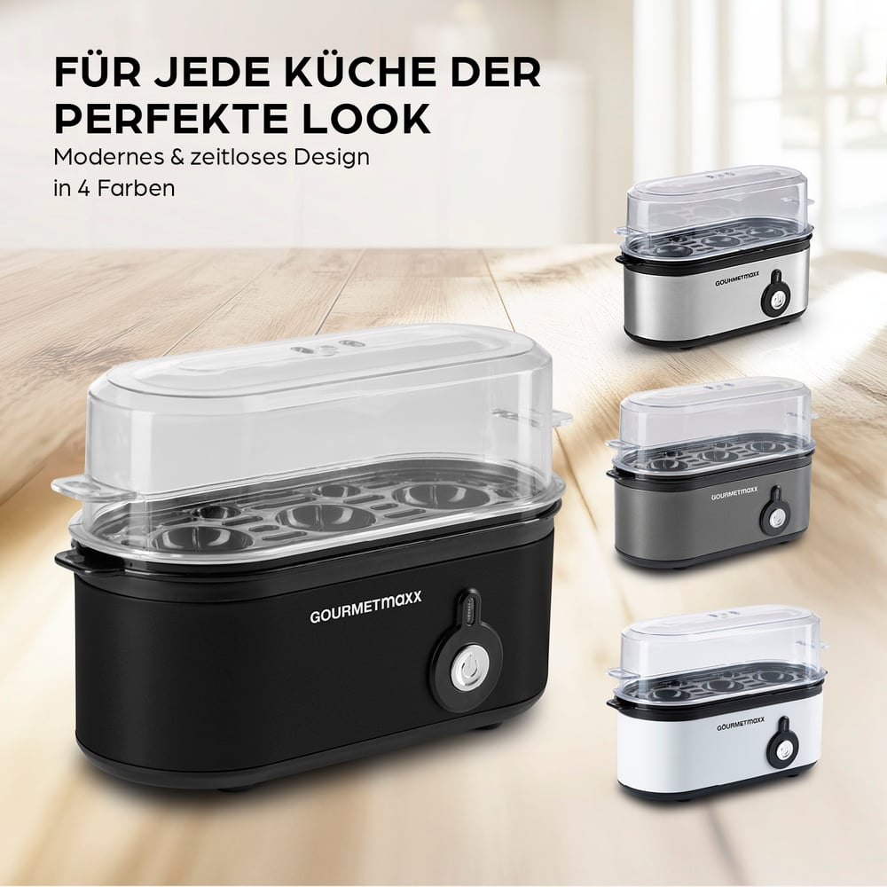 Ein Eierkocher in Schwarz, Silber, Grau und Weiß auf einer Holzoberfläche. Text: Perfekter Look für jede Küche, modernes Design in 4 Farben.