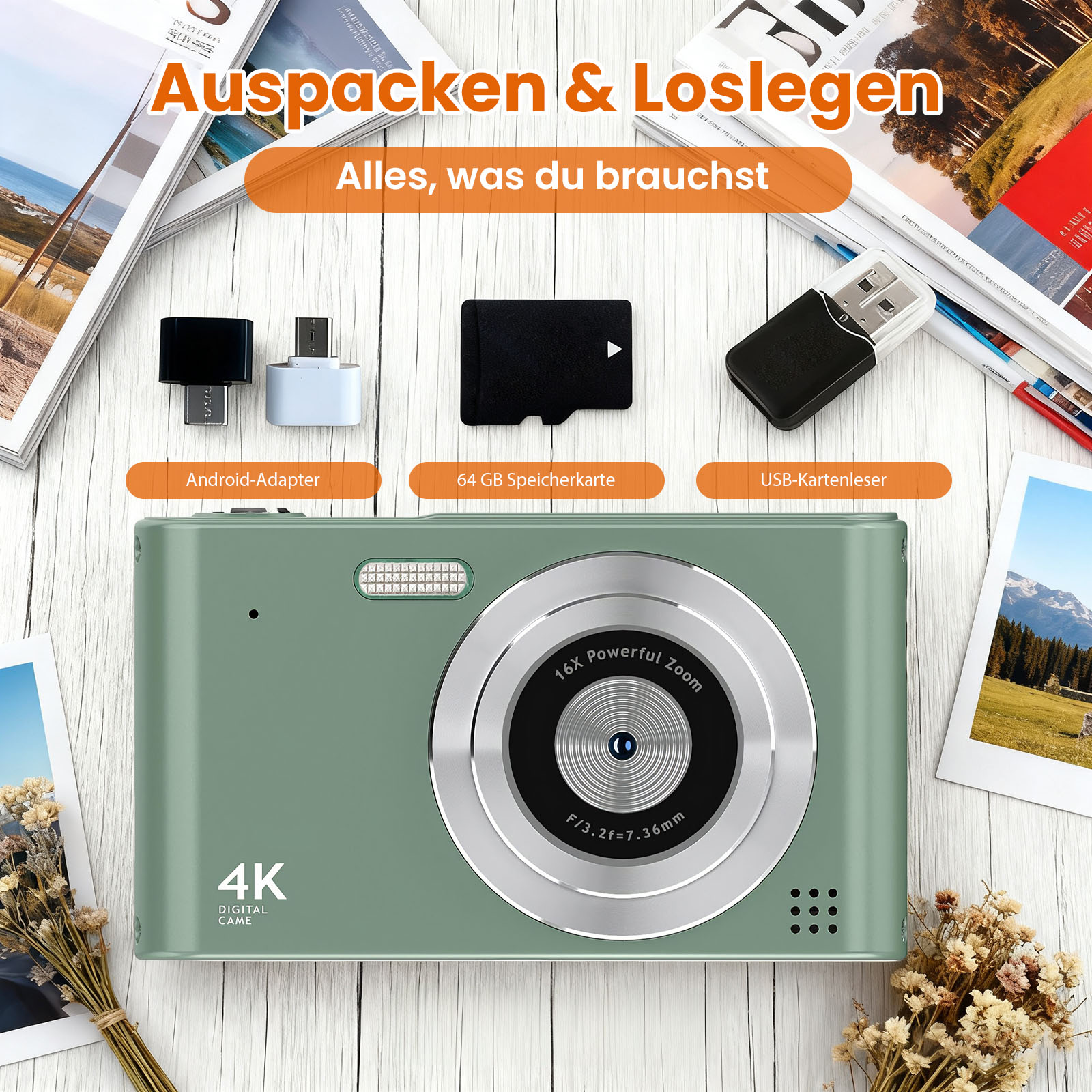 Grüne Digitalkamera mit Zubehör wie Adapter, SD-Karte und USB-Leser. Zeitschriften und Blumen sind ebenfalls im Bild.