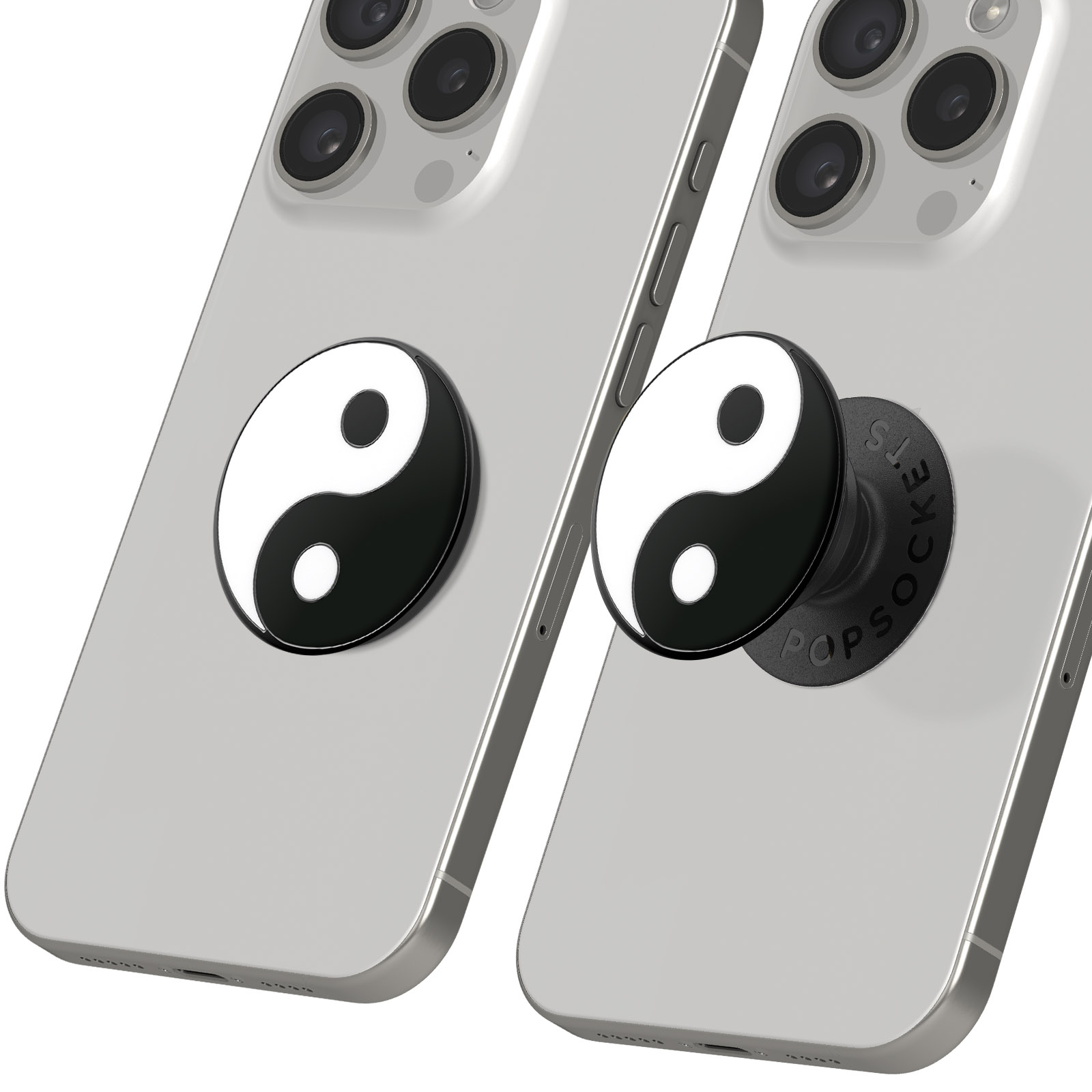 Dos smartphones plateados con PopSockets de yin-yang. Los PopSockets son blancos y negros. El fondo es blanco.