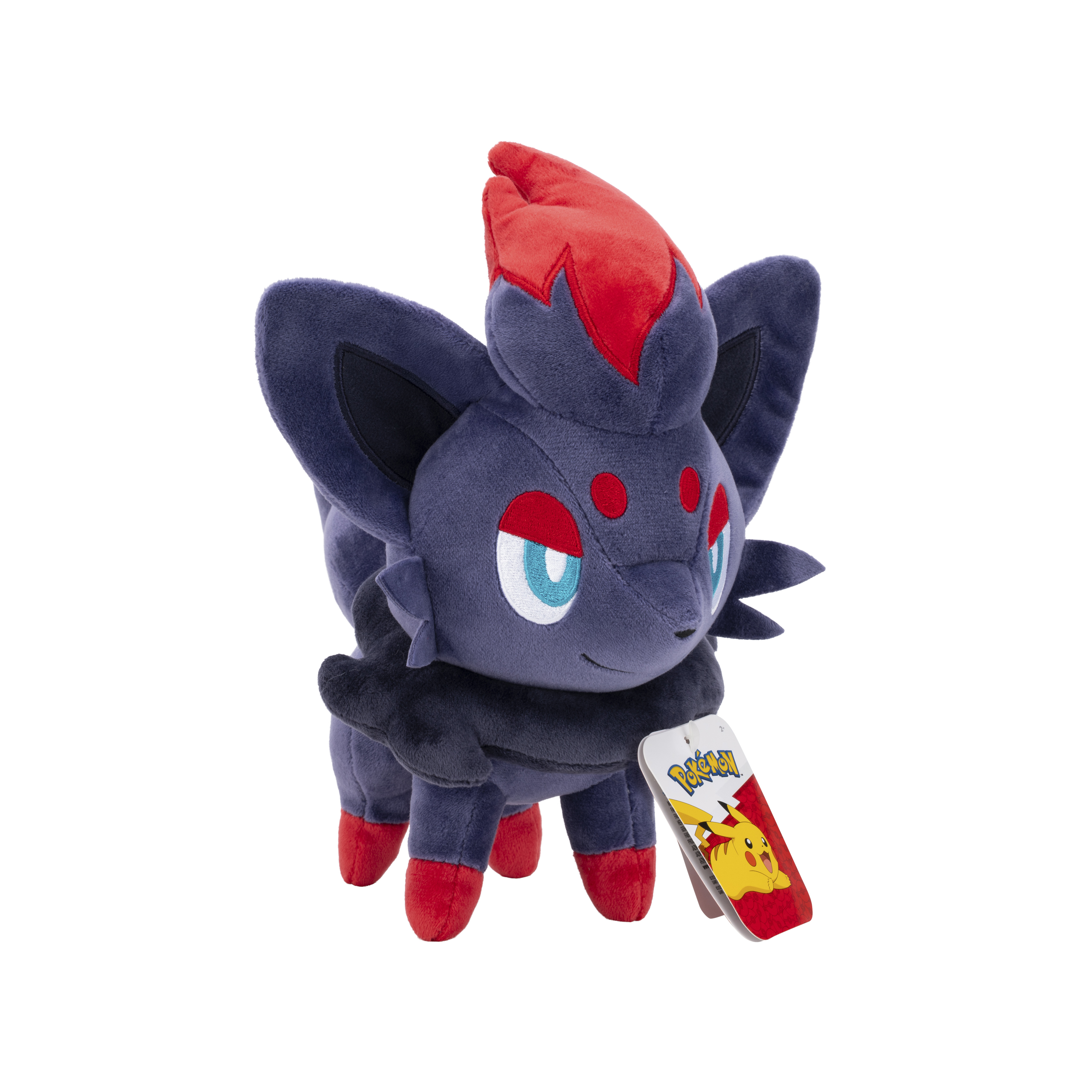 Peluche Zorua con dettagli rossi ed etichetta Pokémon su sfondo bianco.