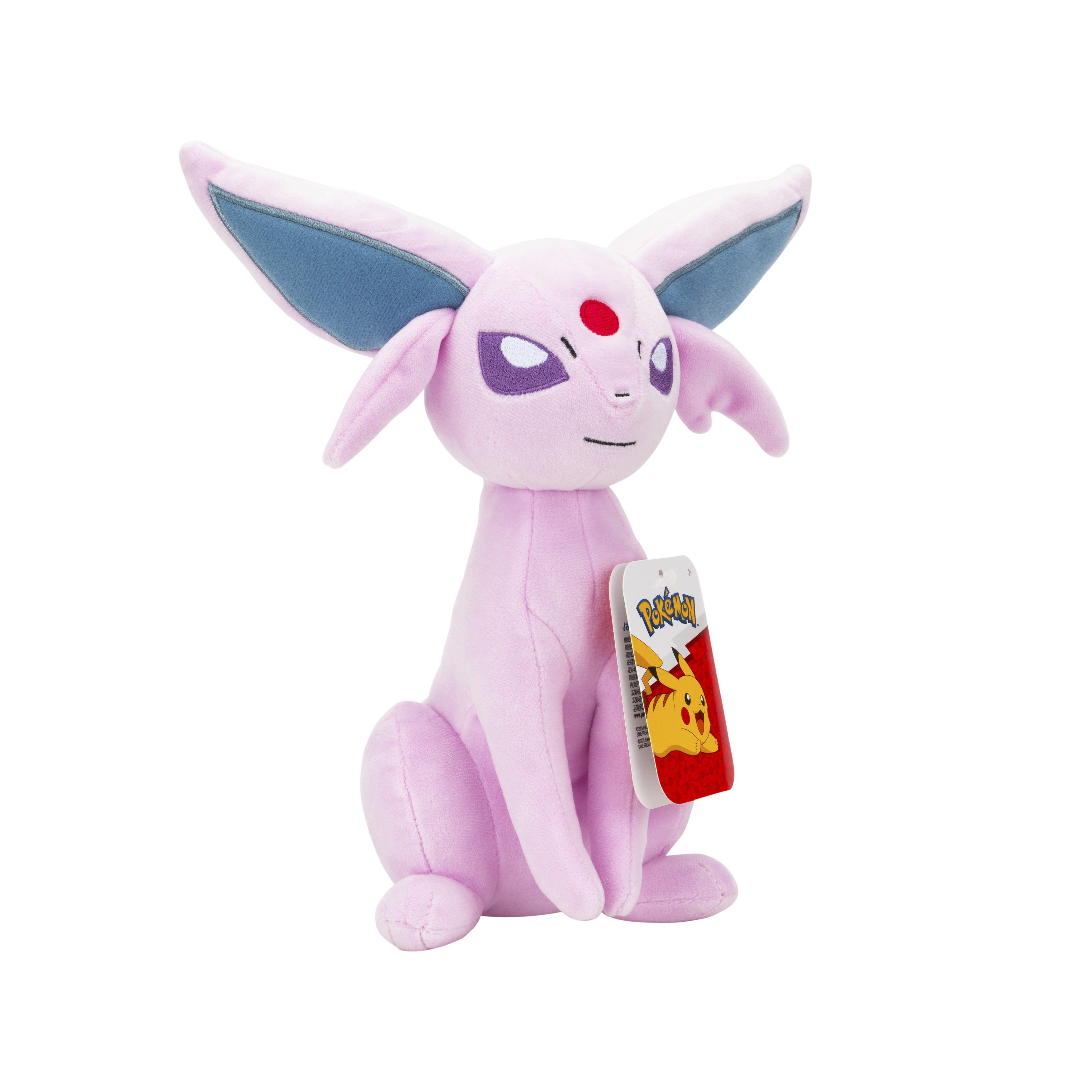 Un peluche rosa di un personaggio Pokémon, Espeon. Ha occhi viola, un gioiello rosso e un'etichetta con Pikachu.