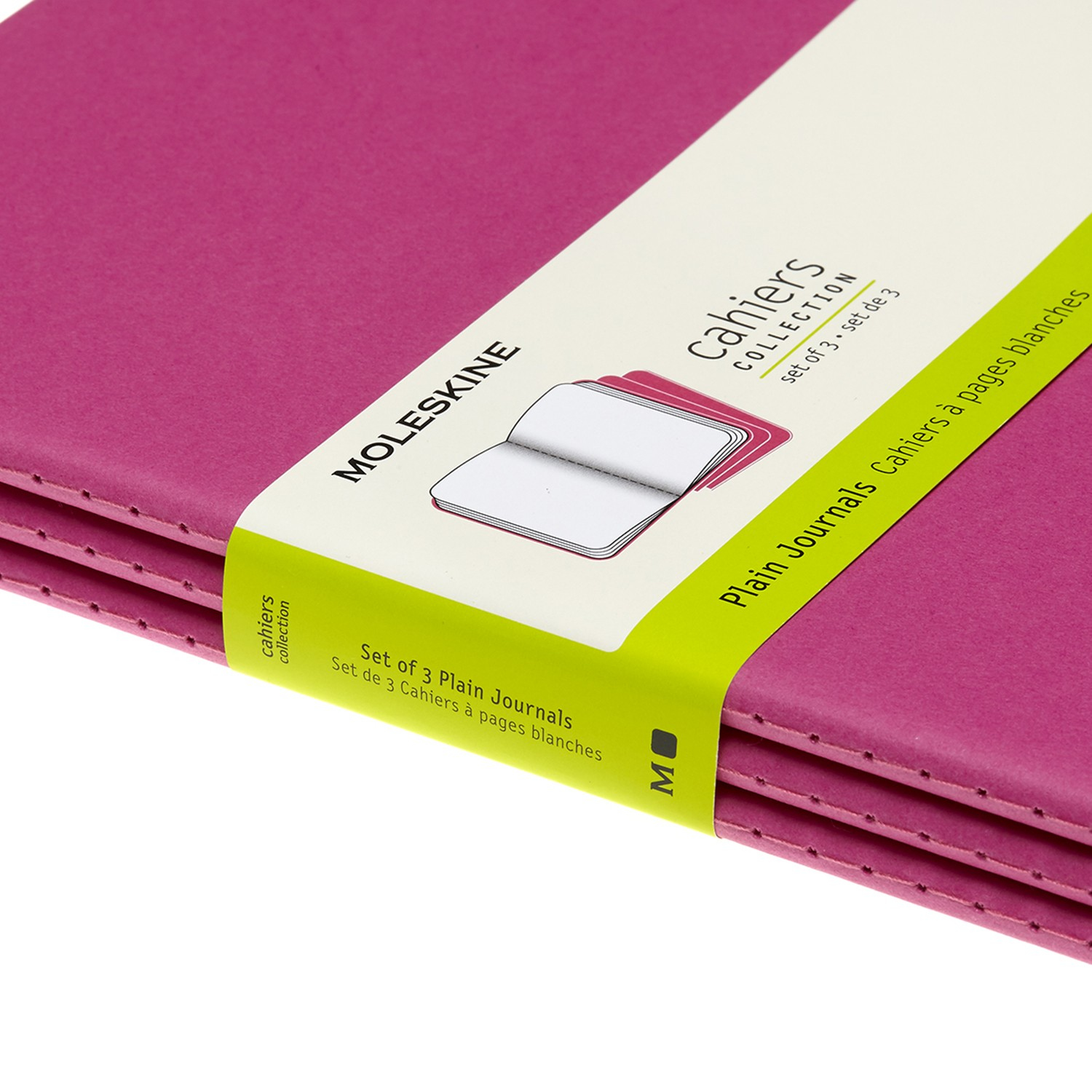 Drei pinkfarbene Moleskine-Notizbücher mit grün-weißem Band. Auf dem Band steht 'cahiers collection' und 'plain journals'.