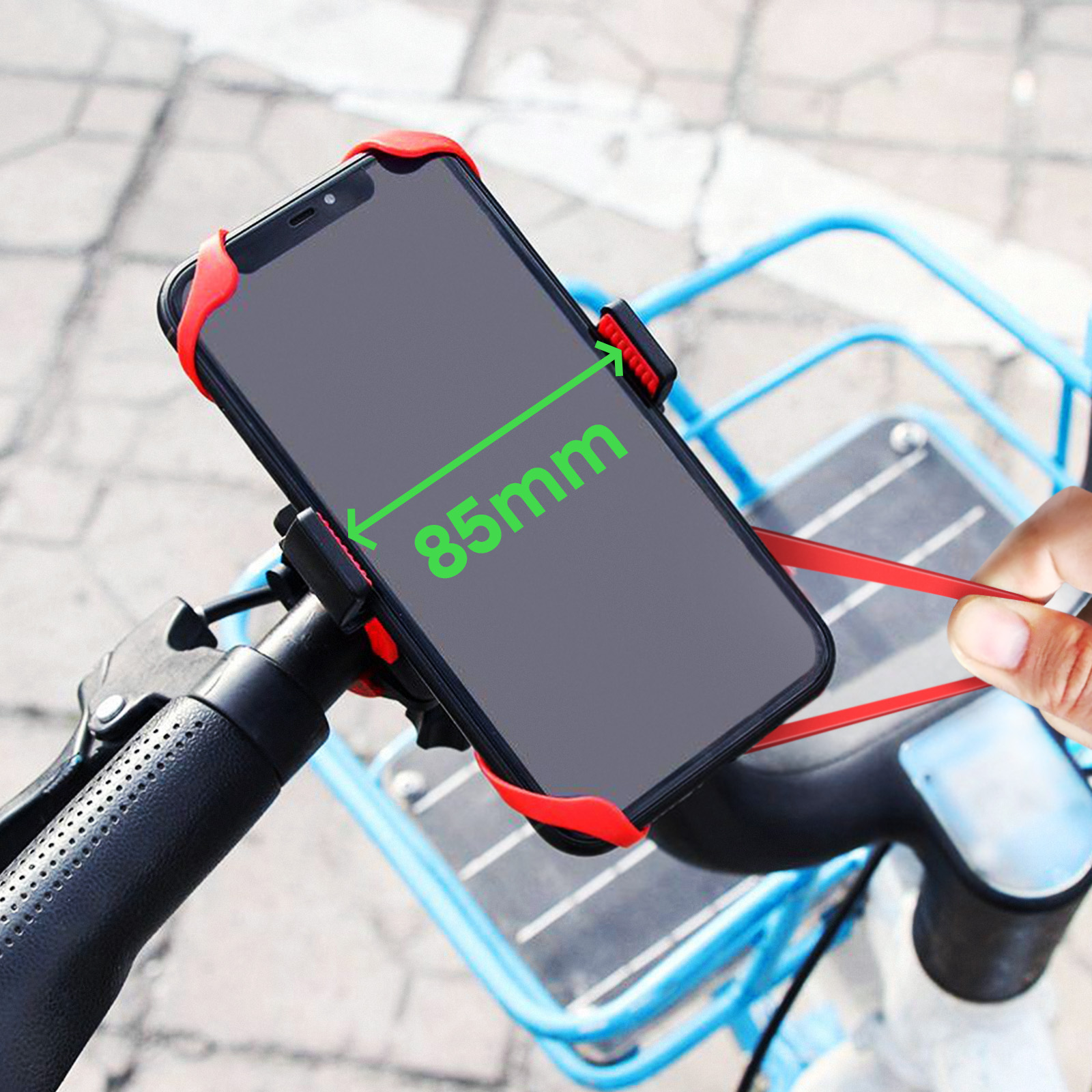 Un telefono è montato su una bicicletta. Lo schermo mostra '85mm'. Una mano tiene una cinghia rossa.