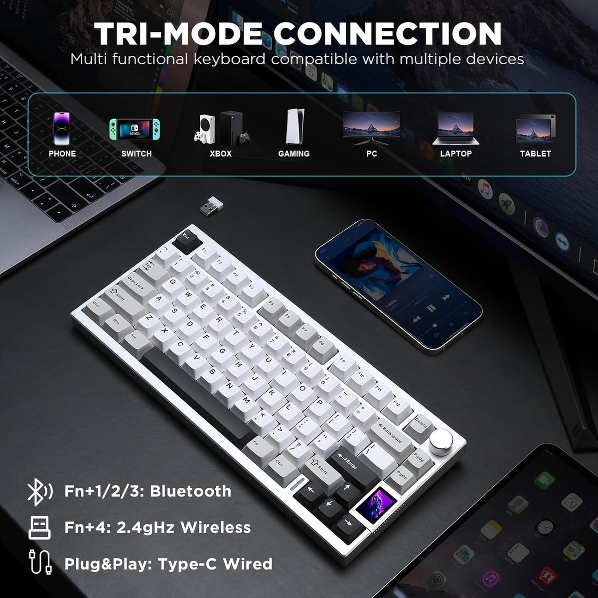 A white keyboard on a black surface. A phone and tablet are on the sides. Text above reads 'TRI-MODE CONNECTION'.