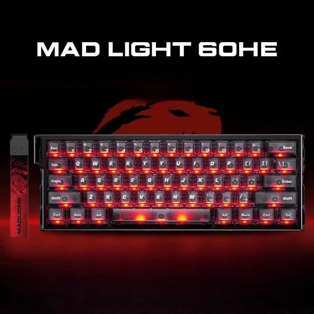 A glowing red backlit keyboard with transparent keys. The brand name is MAD LIGHT 60HE. A MADLIONS logo is on the side.